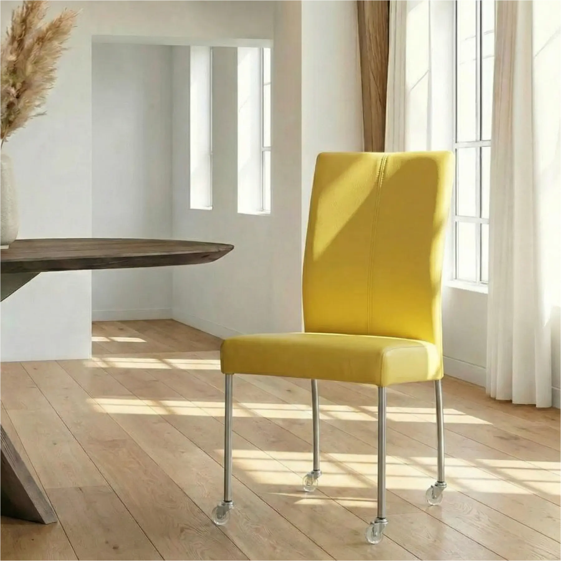 afbeelding van Leren eetkamerstoel Comfort met wieltjes - Hermes Yellow (felgeel) - Poten staal rond RVS