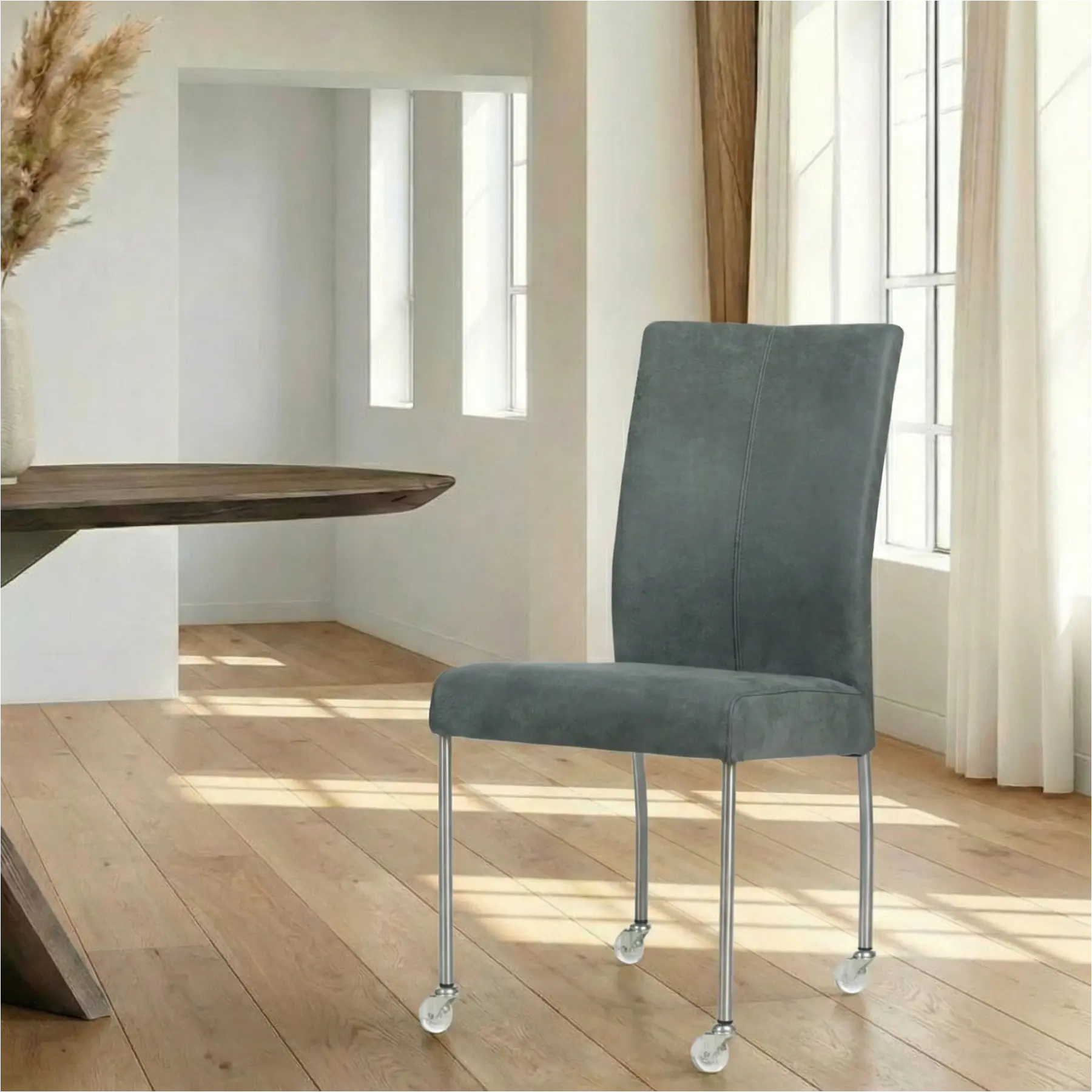 afbeelding van Leren eetkamerstoel Comfort met wieltjes - Kenia Denim (blauw) - Poten staal rond RVS