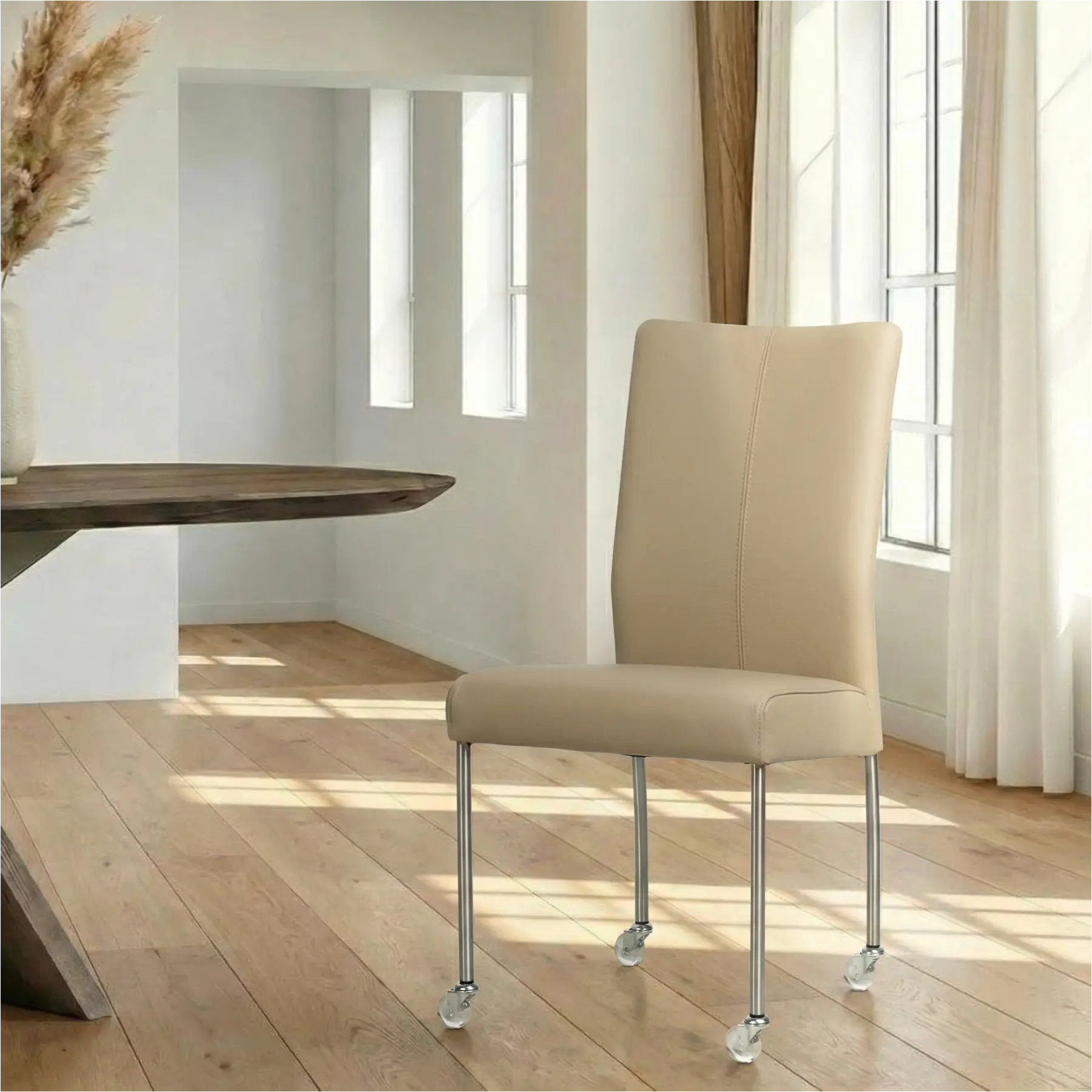 afbeelding van Leren eetkamerstoel Comfort met wieltjes - Toledo Mastic (taupe/bruin) - Poten staal rond RVS