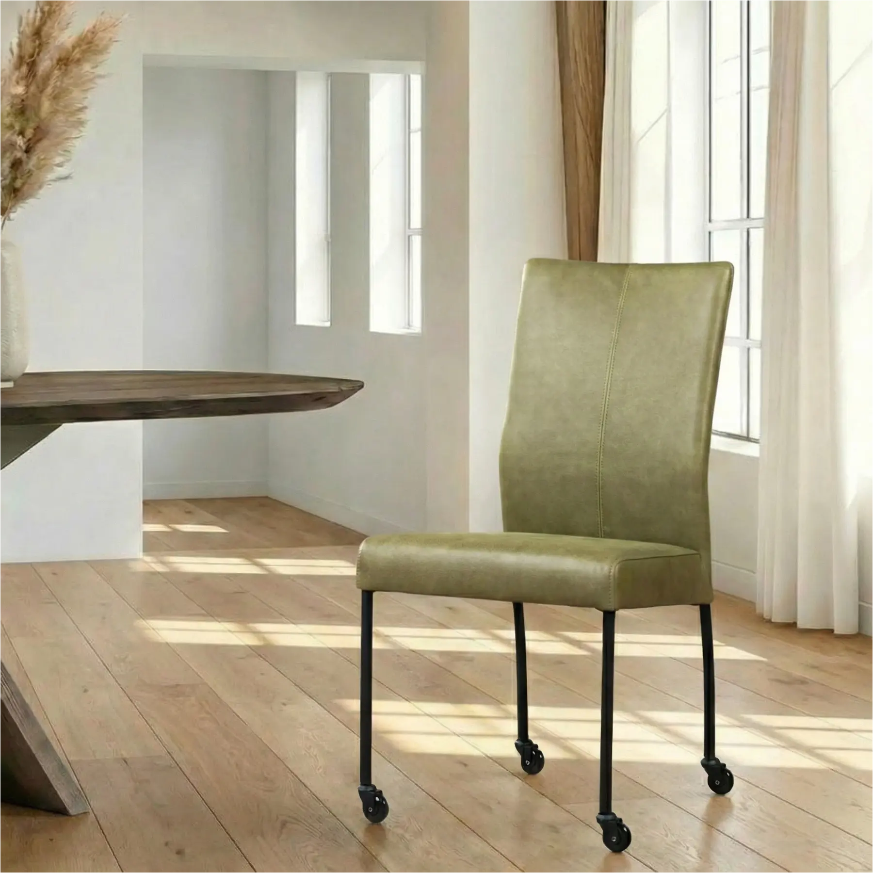 afbeelding van Leren eetkamerstoel Comfort met wieltjes - Vintage Olive (olijf/groen) - Poten staal rond zwart