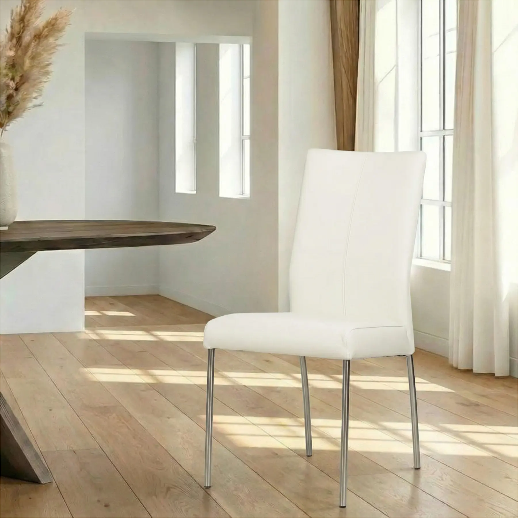 afbeelding van Leren eetkamerstoel Comfort - Toledo Bianco (gebroken wit) - Poten staal rond RVS