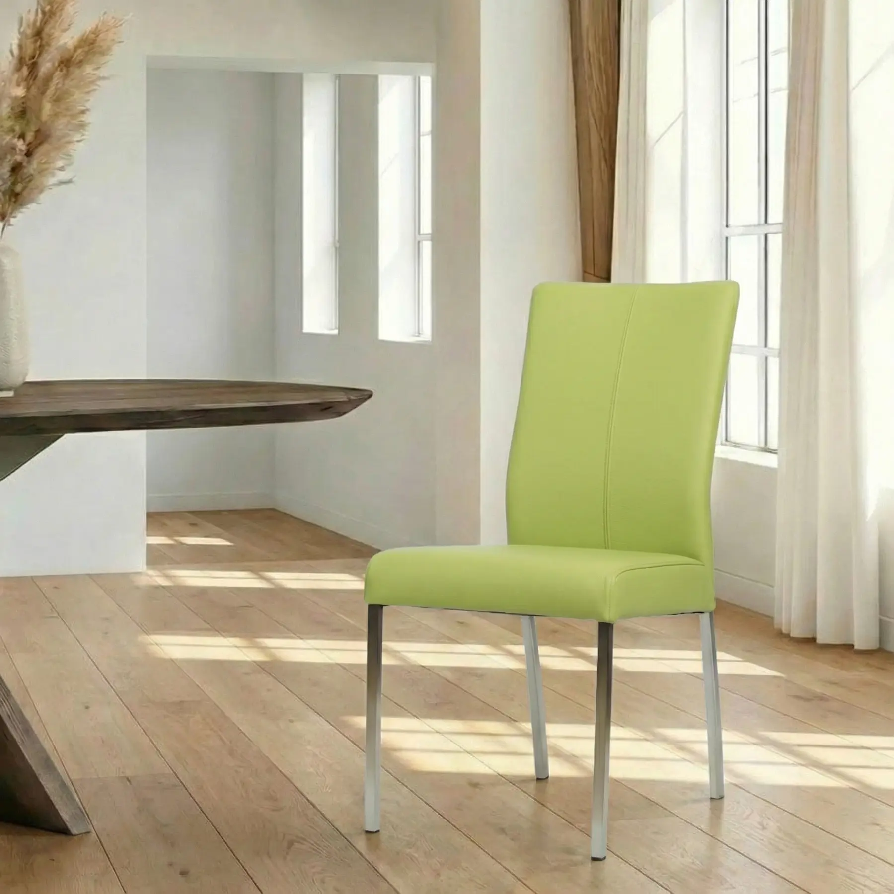 afbeelding van Leren eetkamerstoel Comfort met armleuning - Toledo Lime (felgroen) - Poten staal rond RVS