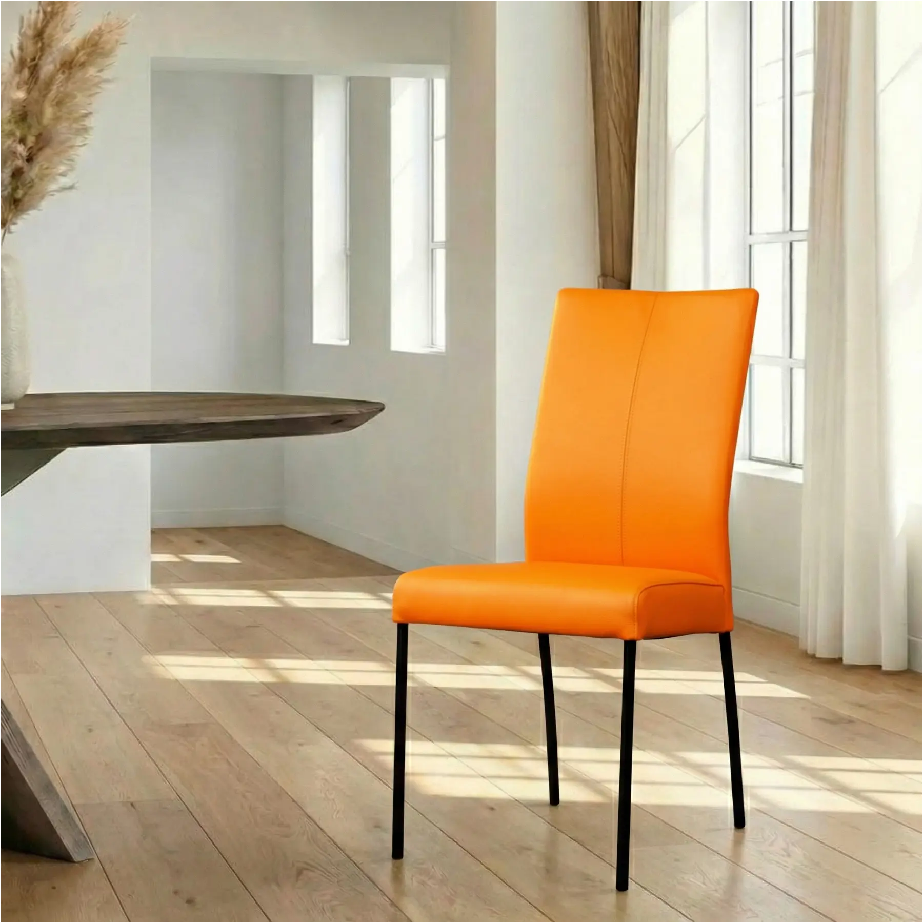 afbeelding van Leren eetkamerstoel Comfort - Toledo Mandarin (oranje) - Poten staal rond zwart