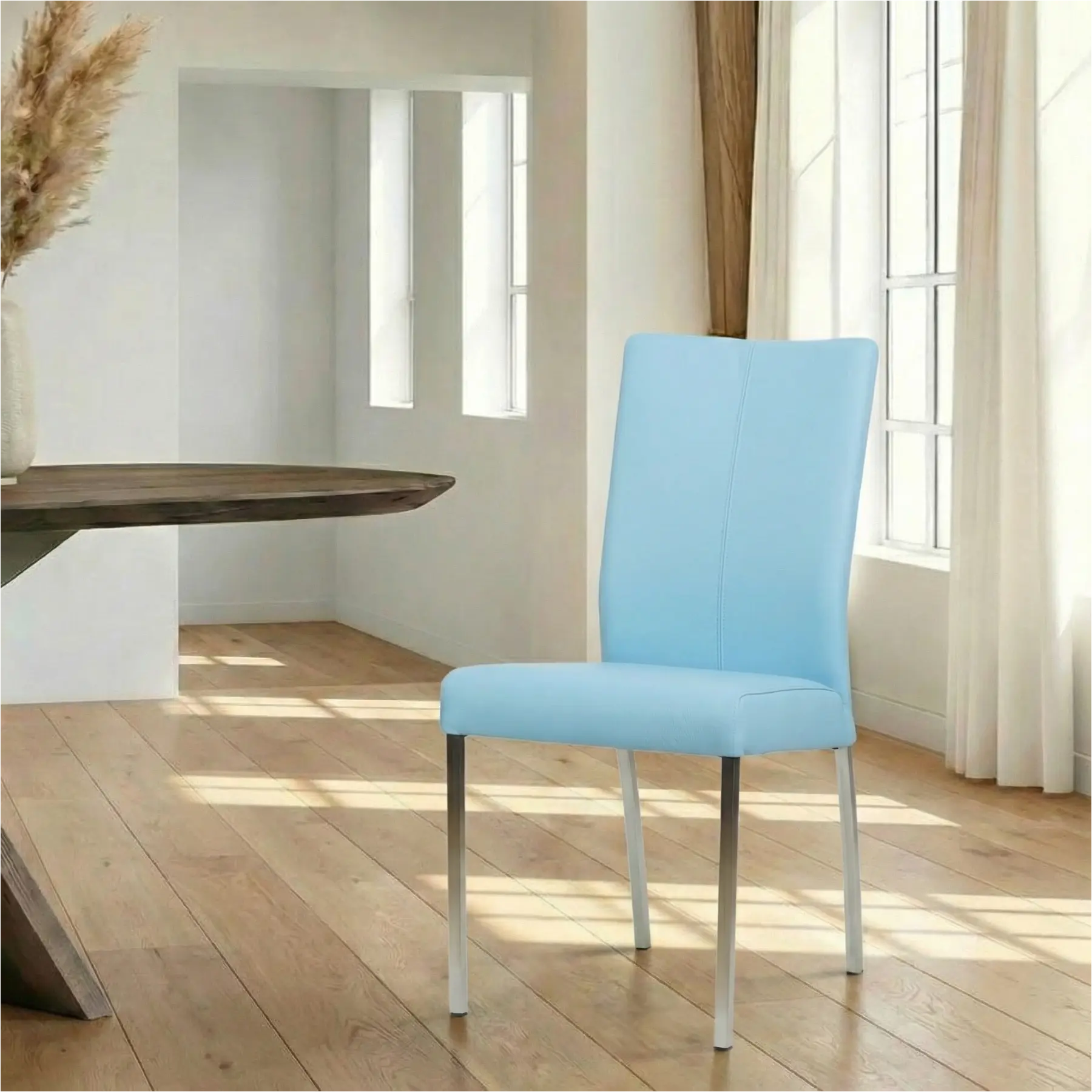 afbeelding van Leren eetkamerstoel Comfort - Toledo Sky Blue (lichtblauw) - Poten staal vierkant RVS