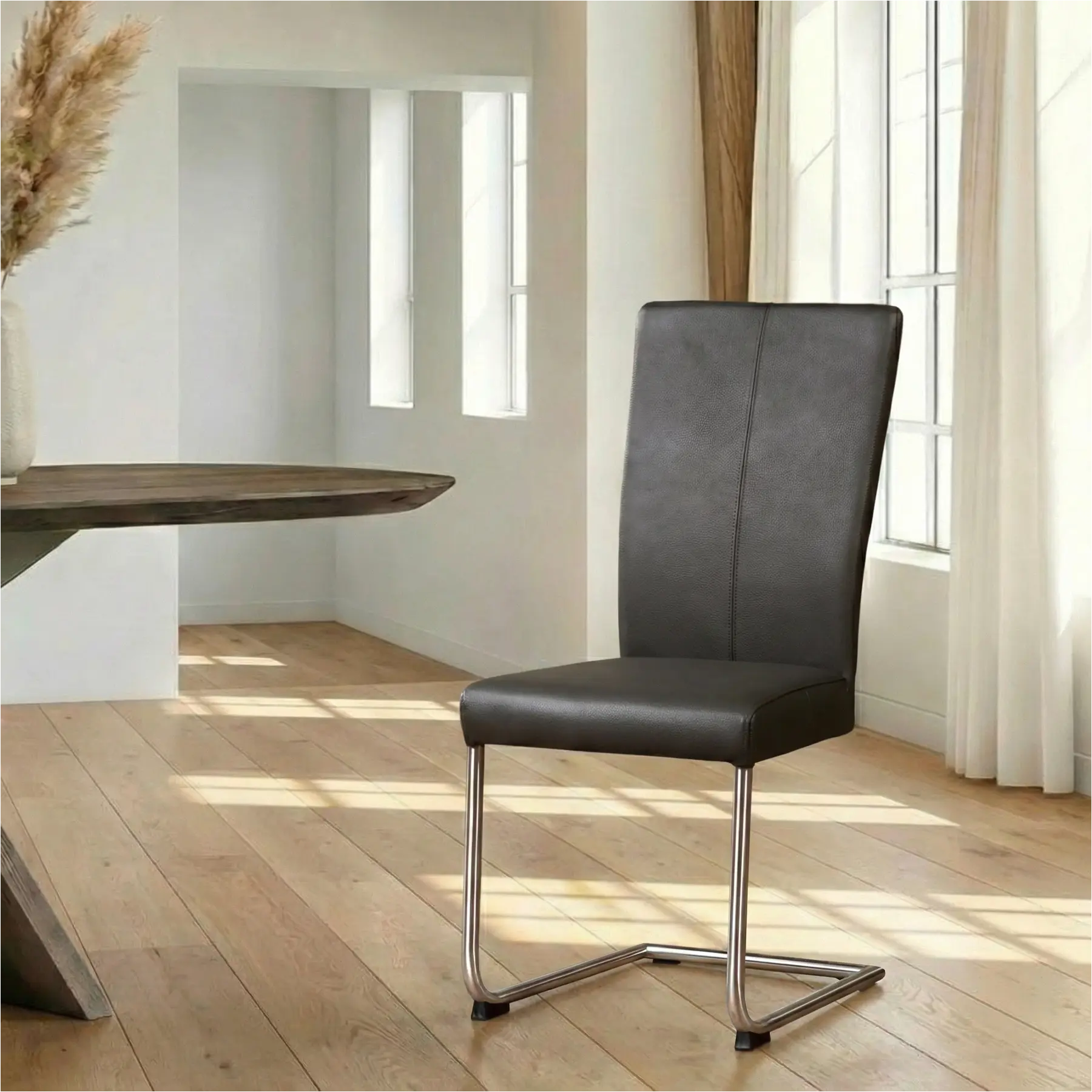 afbeelding van Leren eetkamerstoel Dry - Toledo Antracite (donkergrijs) - Sledepoot staal rond RVS