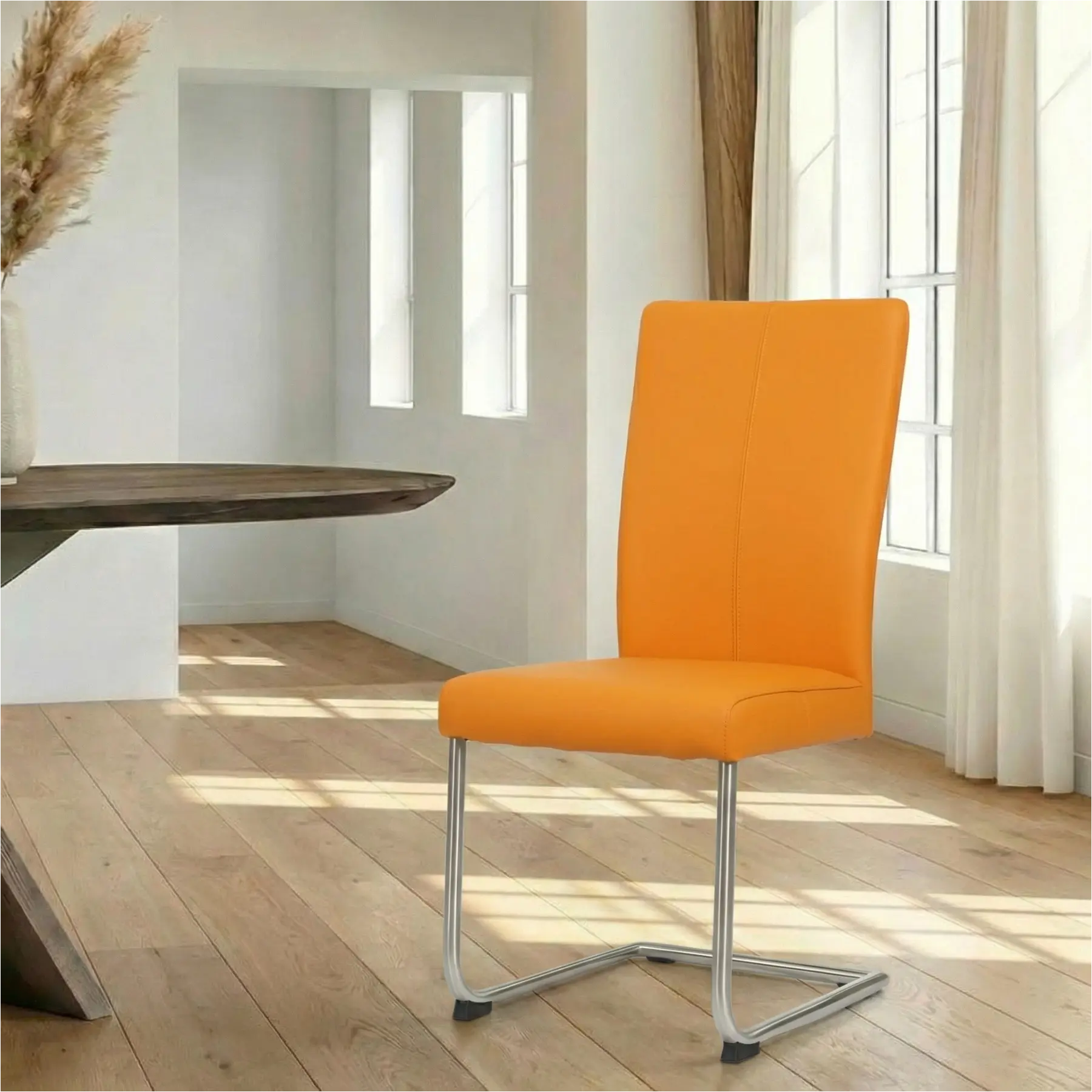 afbeelding van Leren eetkamerstoel Dry - Toledo Mandarin (oranje) - Sledepoot staal rond RVS
