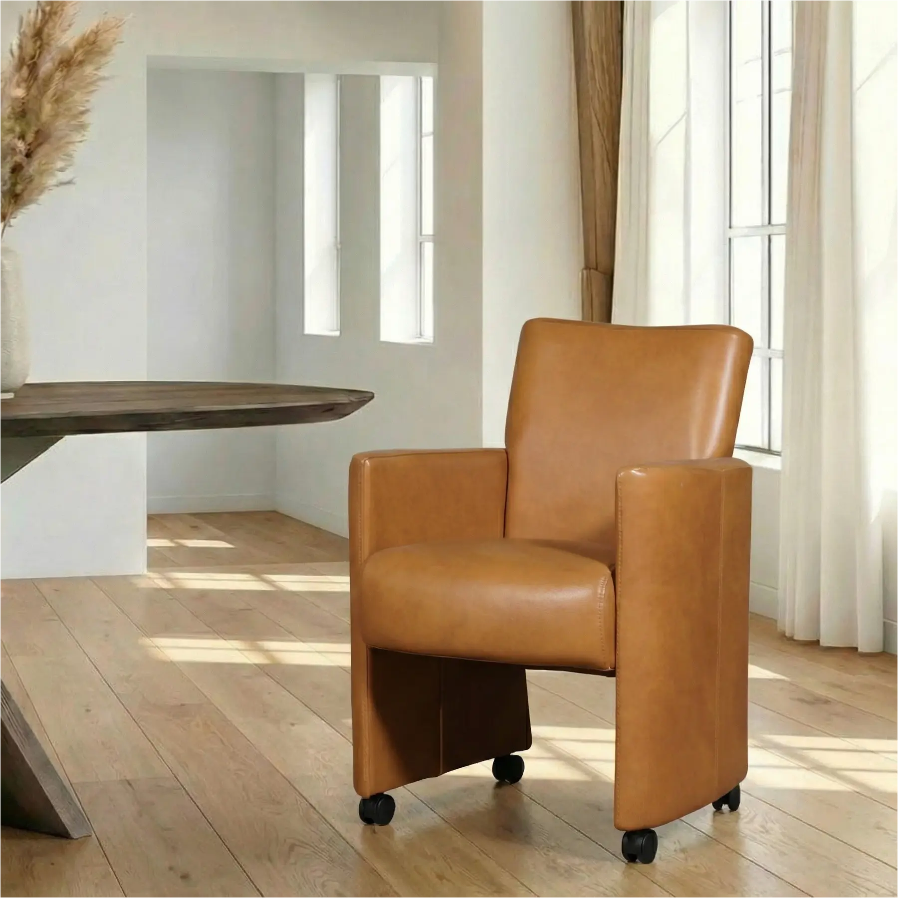 afbeelding van Leren eetkamerstoel Elegant - Granada Sahara (cognac) - Met handgreep RVS