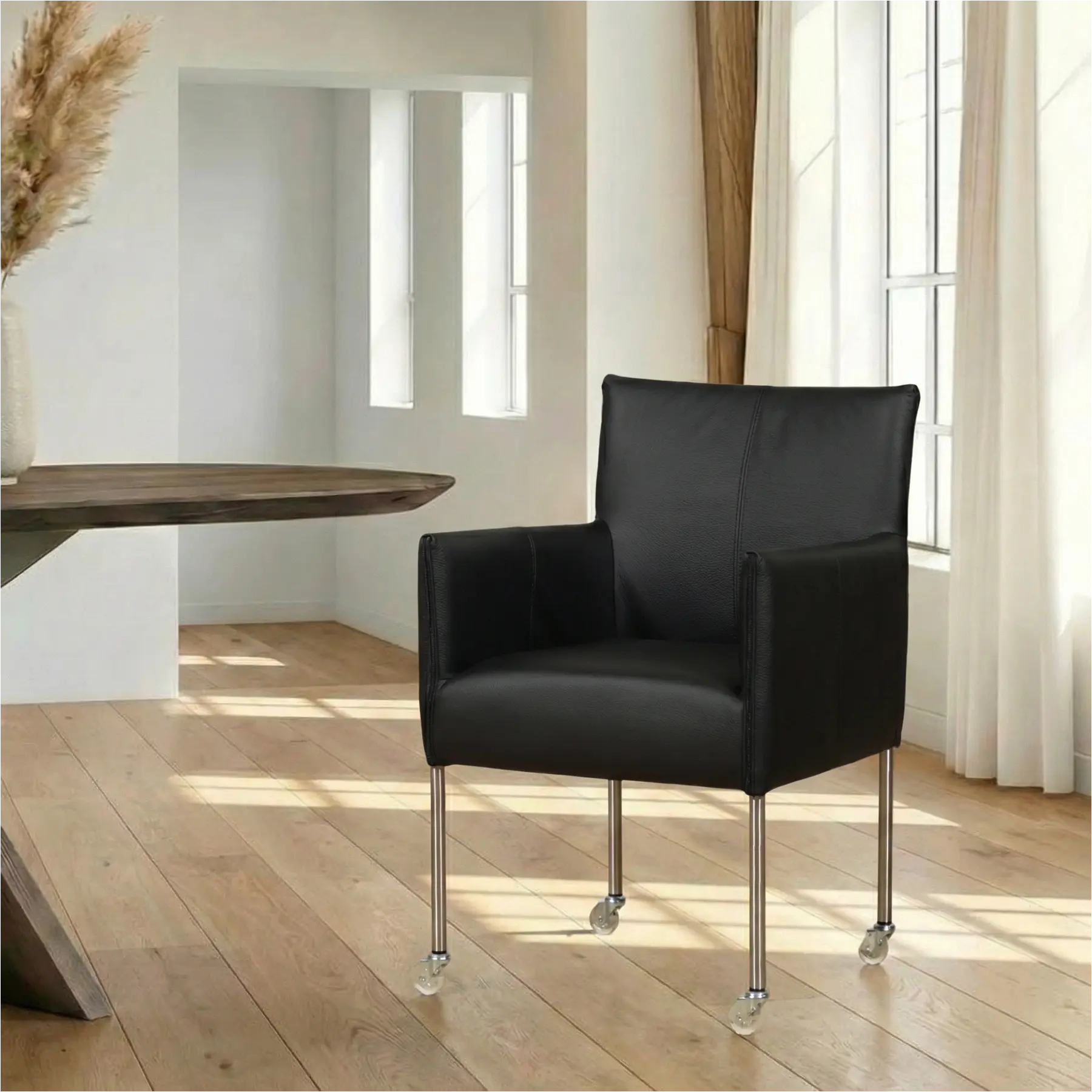 afbeelding van Leren eetkamerstoel More - Toledo Nero (zwart) - Poten staal rond RVS