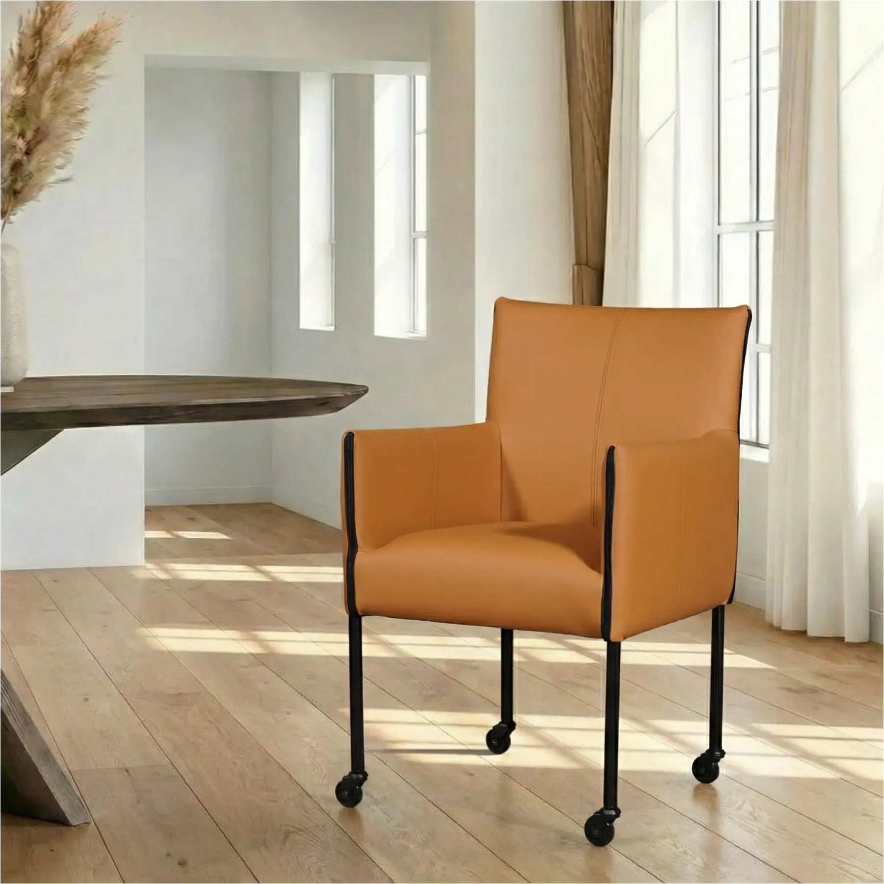 afbeelding van Leren eetkamerstoel More - Toledo Sabbia (lichtcognac) - Poten staal rond zwart