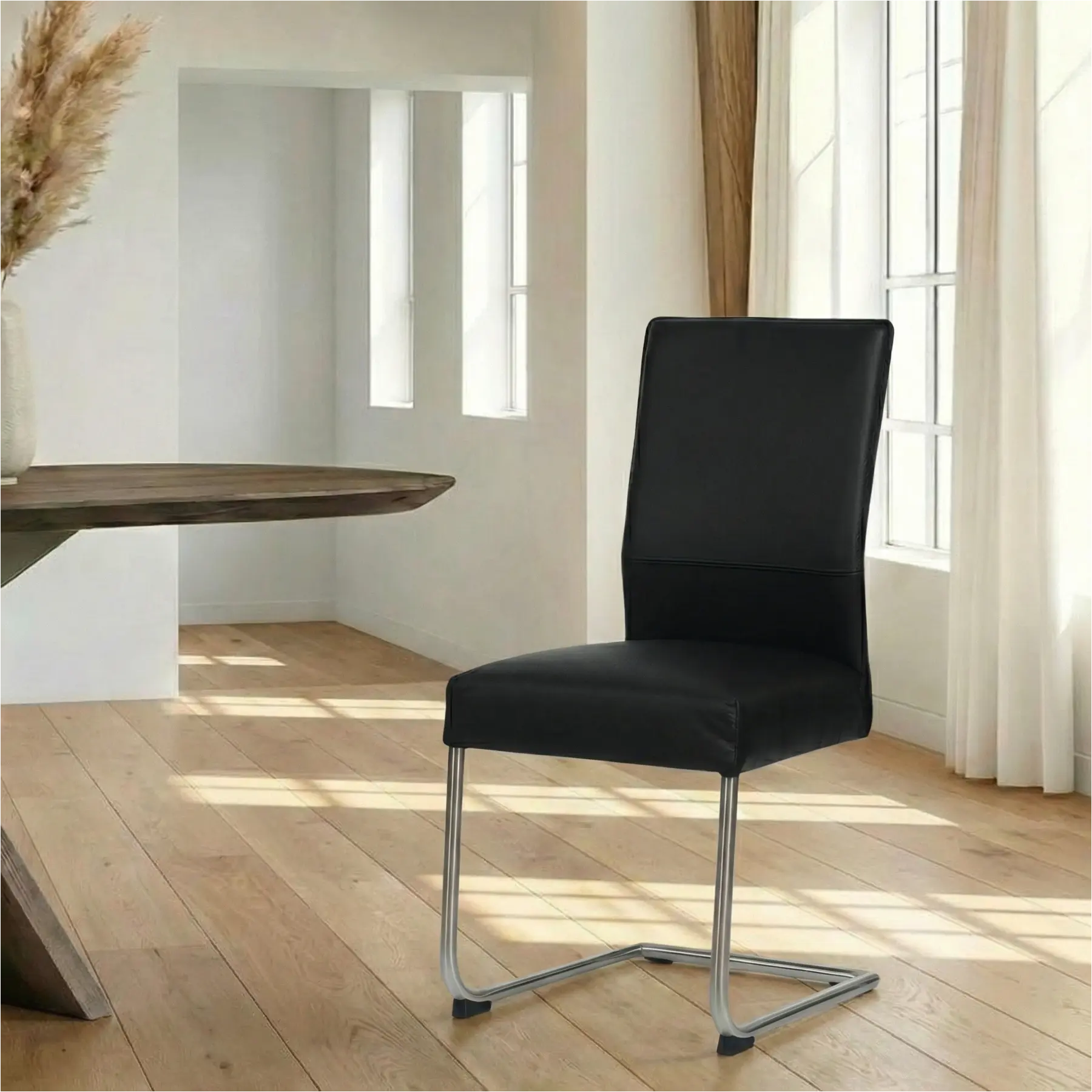 afbeelding van Leren eetkamerstoel Piece - Hermes Nero (zwart) - Sledepoot staal rond RVS