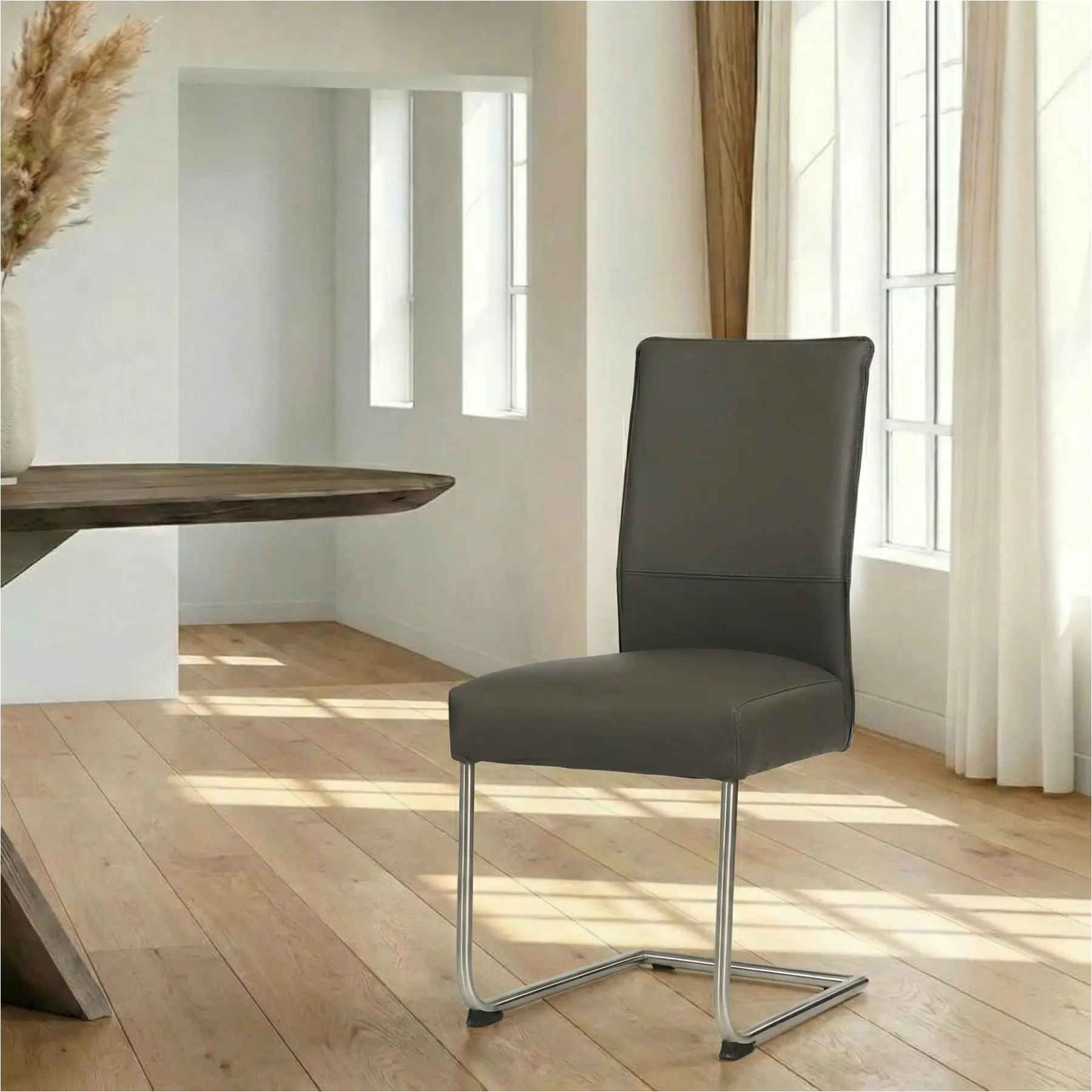 afbeelding van Leren eetkamerstoel Piece - Toledo Antracite (donkergrijs) - Sledepoot staal rond RVS