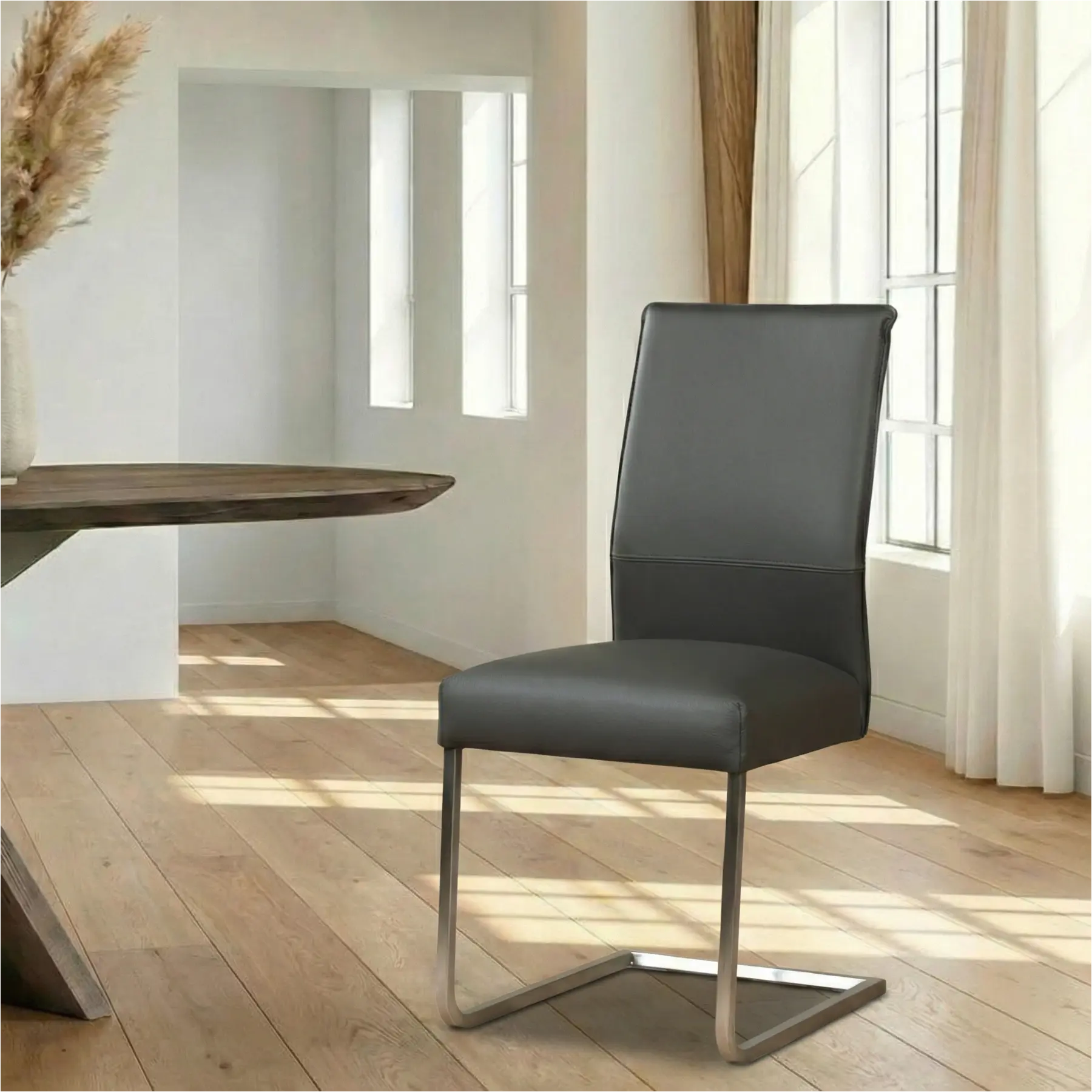 afbeelding van Leren eetkamerstoel Remix - Toledo Antracite (donkergrijs) - Sledepoot staal vierkant RVS