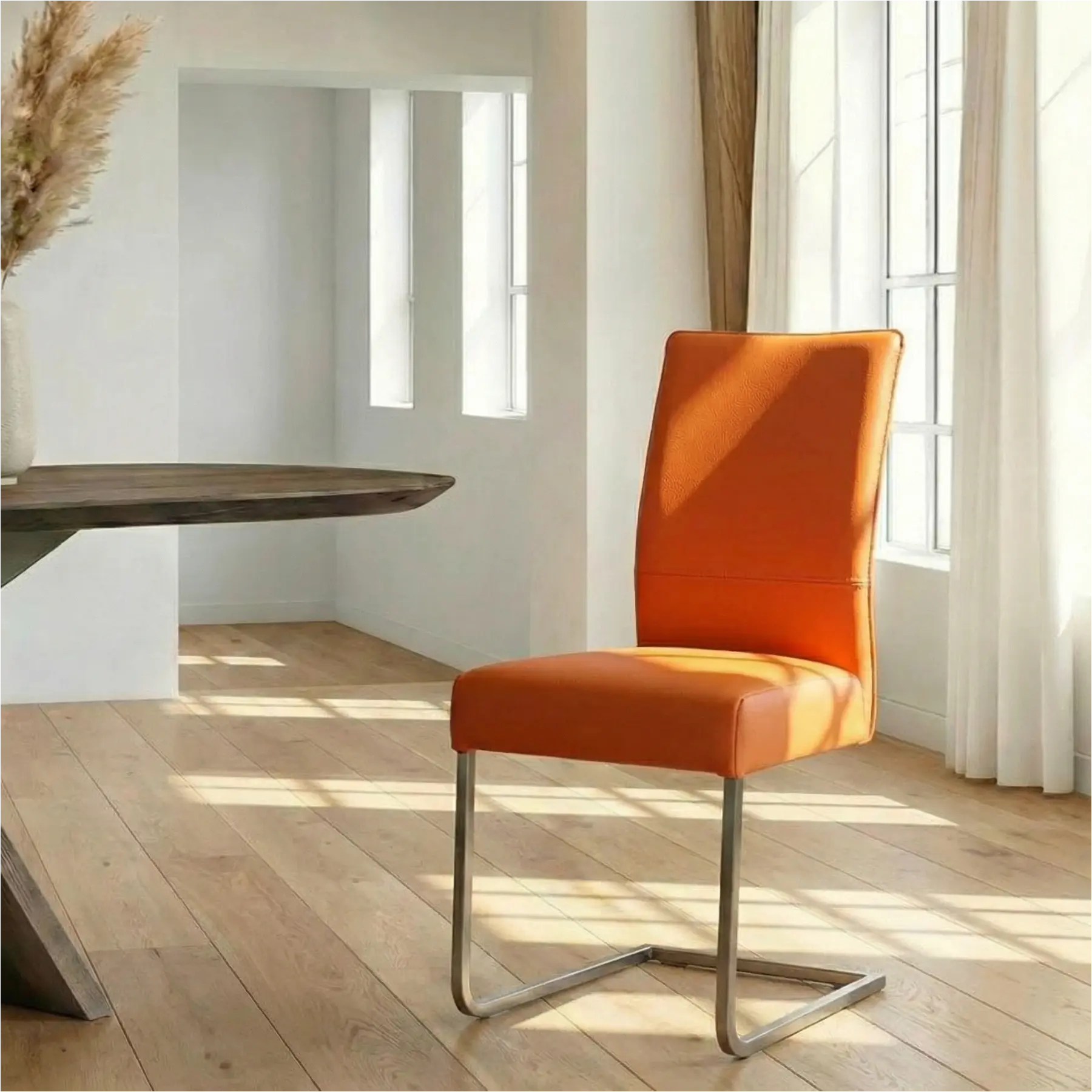 afbeelding van Leren eetkamerstoel Remix - Toledo Orange (oranje) - Sledepoot staal vierkant RVS