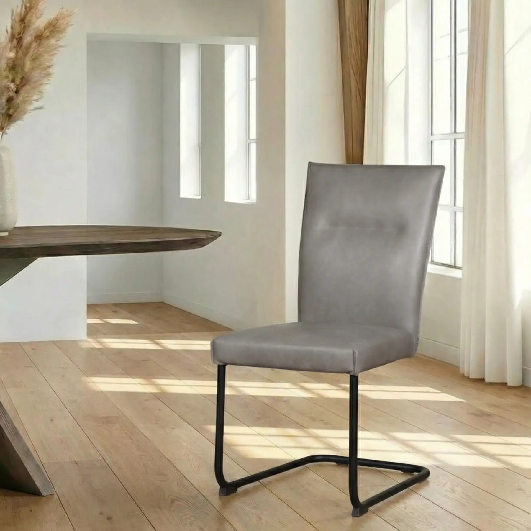 afbeelding van Leren eetkamerstoel Retro - Granada Steel (grijs) - Sledepoot staal rond zwart