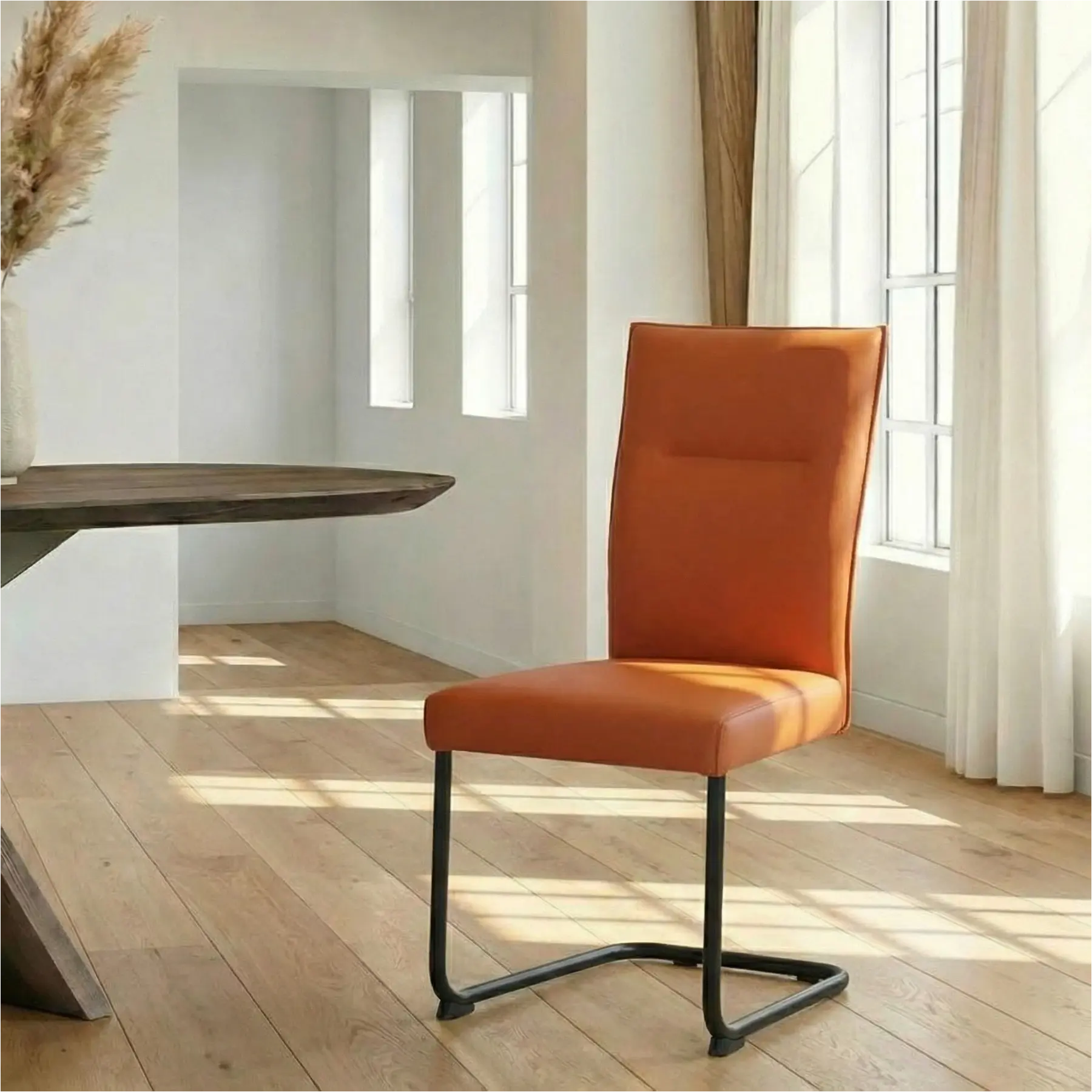 afbeelding van Leren eetkamerstoel Retro - Toledo Cotto (cognac) - Sledepoot staal rond zwart