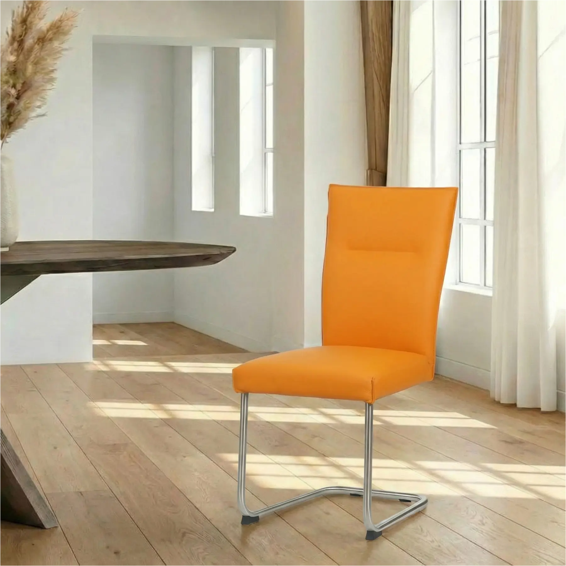 afbeelding van Leren eetkamerstoel Retro - Toledo Mandarin (oranje) - Sledepoot staal rond RVS
