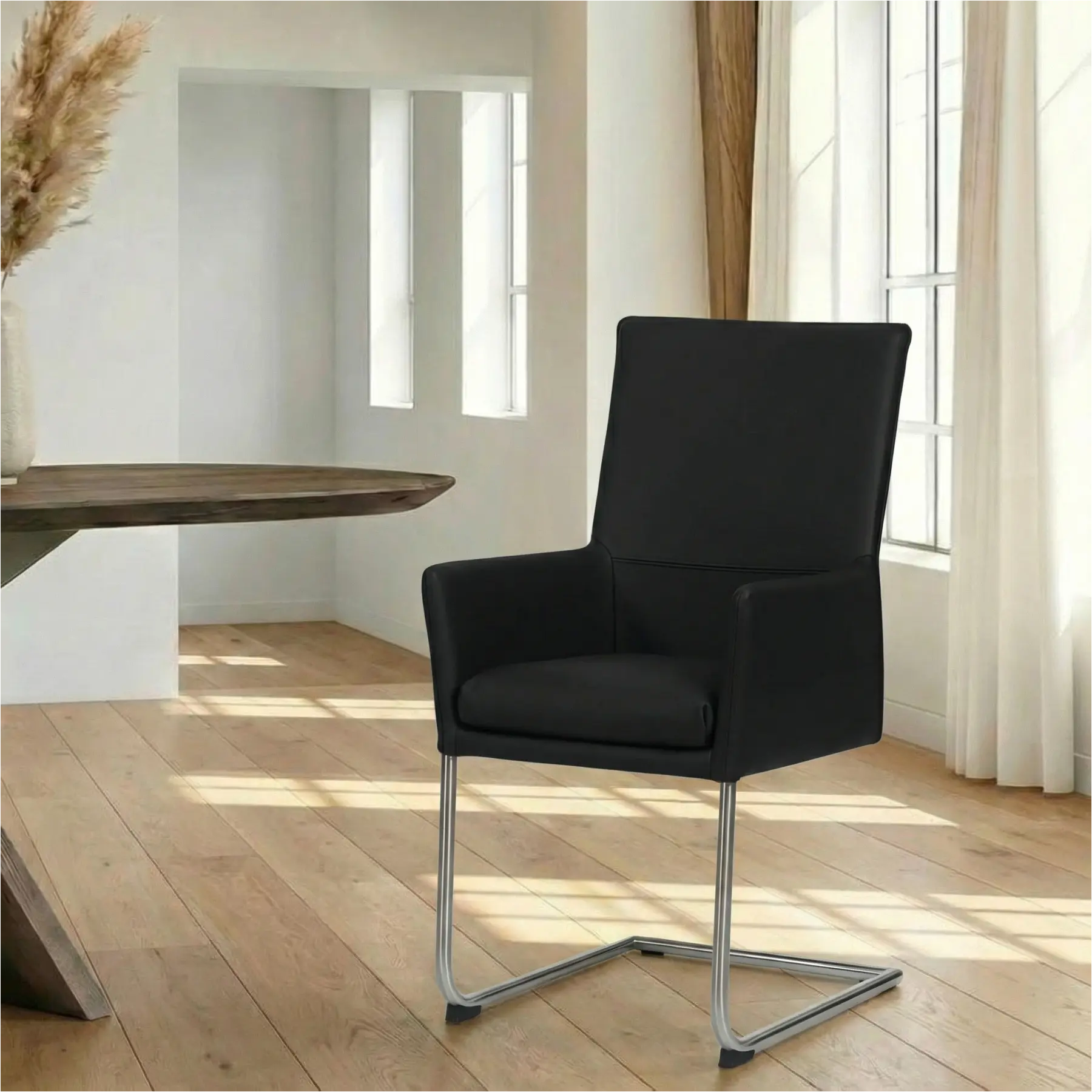 afbeelding van Leren eetkamerstoel Rumor - Hermes Nero (zwart) - Sledepoot staal rond RVS