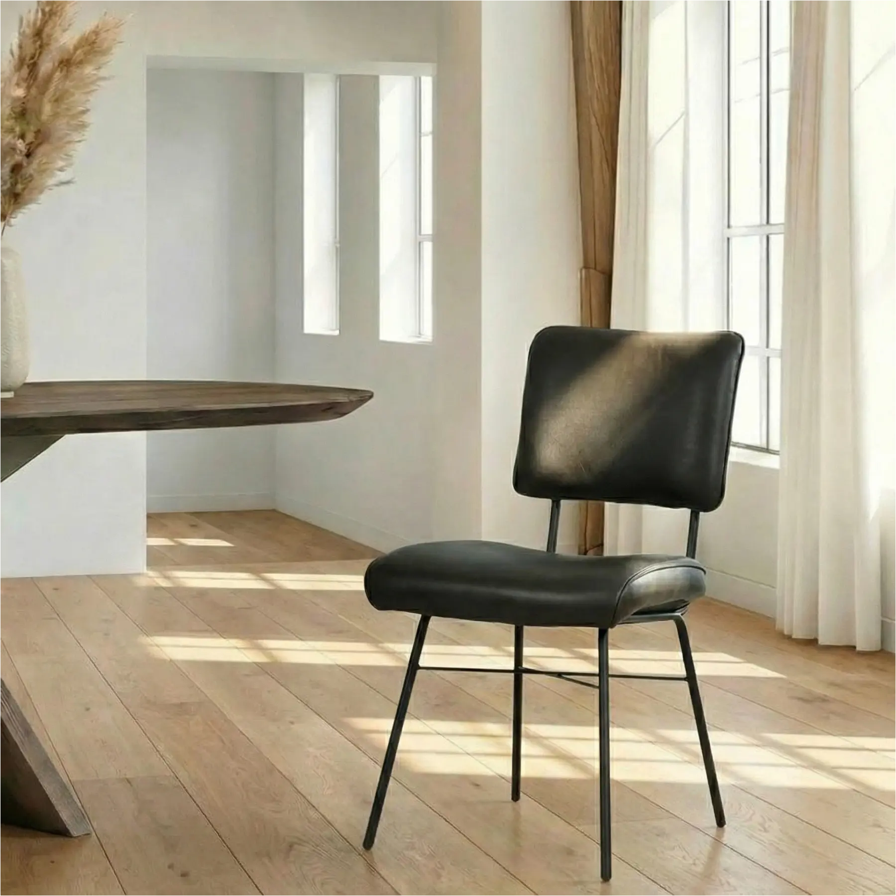 afbeelding van Leren eetkamerstoel Solid - Granada Graphite (donkergrijs) - Poten staal rond zwart