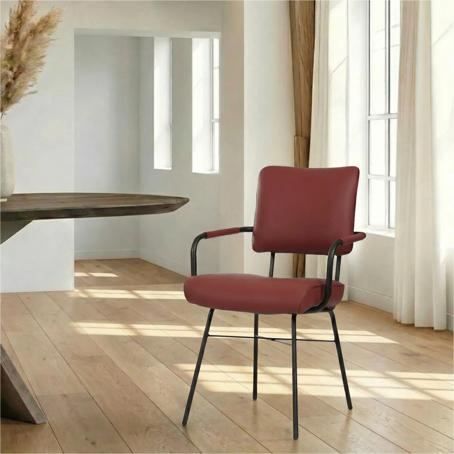 afbeelding van Leren eetkamerstoel Solid met armleuning - Toledo Cherry (rood) - Poten staal rond zwart