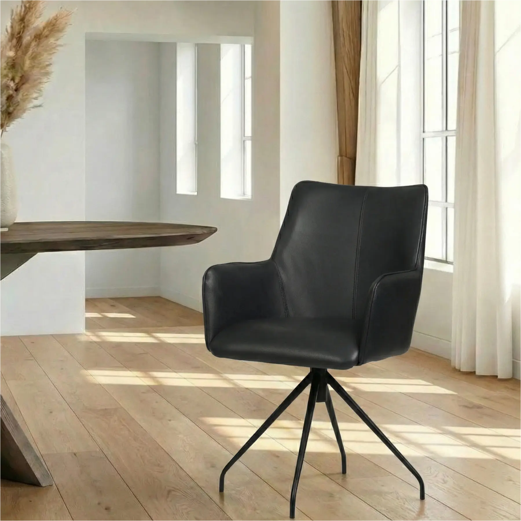 afbeelding van Leren eetkamerstoel Wave - Granada Black (zwart) - Spinpoot staal rond zwart