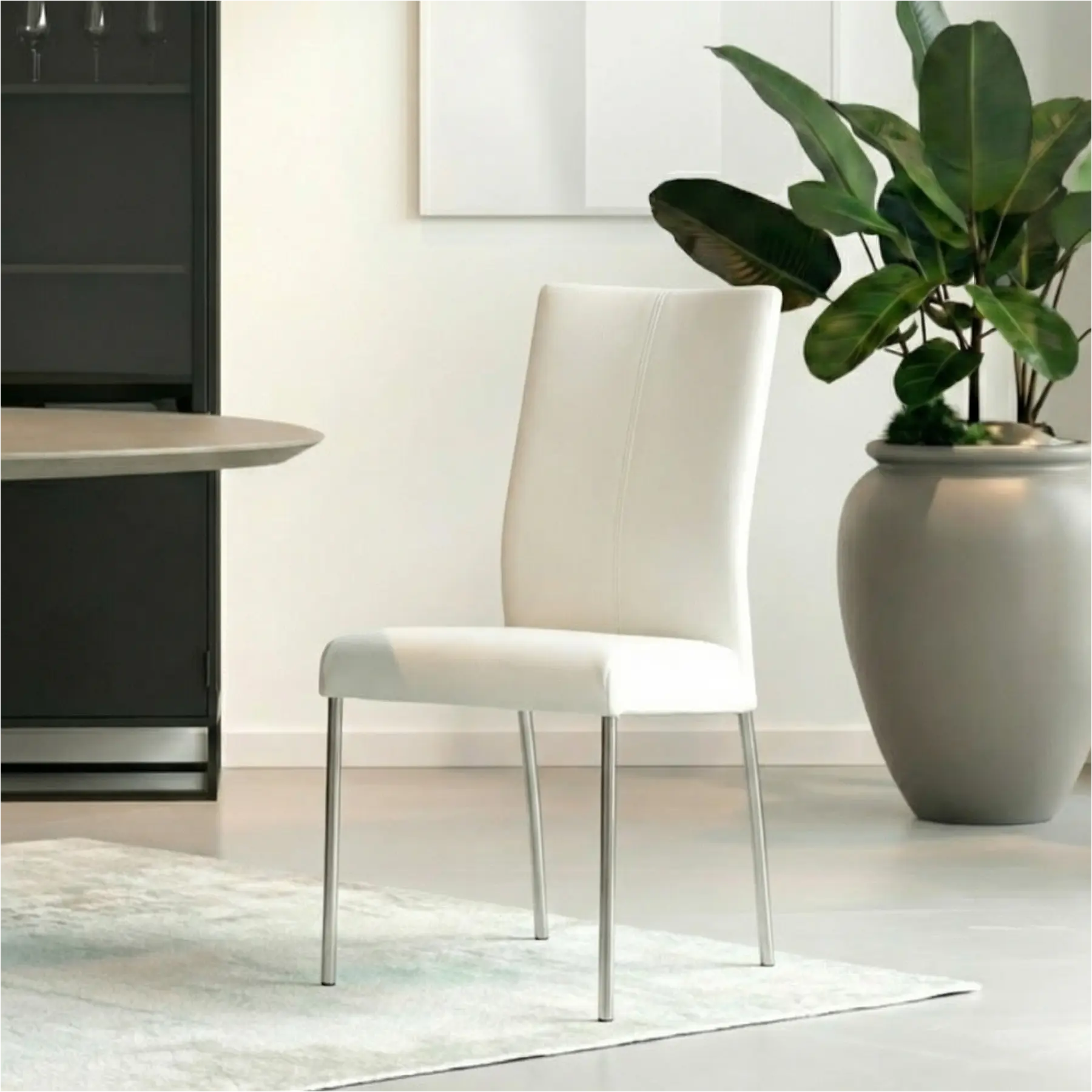 afbeelding van Set van 10 Leren eetkamerstoelen Comfort - Toledo Bianco (gebroken wit) - Poten staal rond RVS