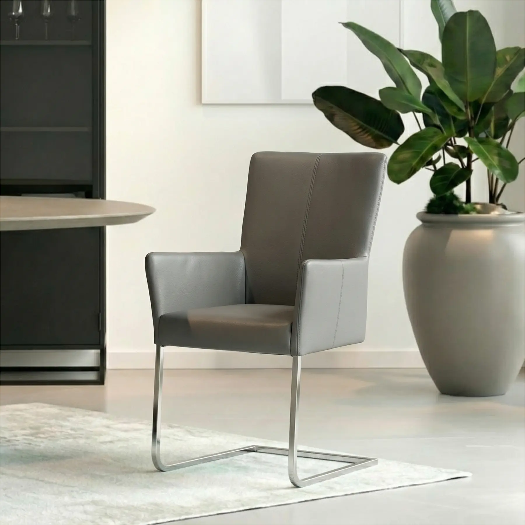 afbeelding van Set van 10 Leren eetkamerstoelen Dare met armleuning - Toledo Antracite (donkergrijs) - Sledepoot staal vierkant RVS