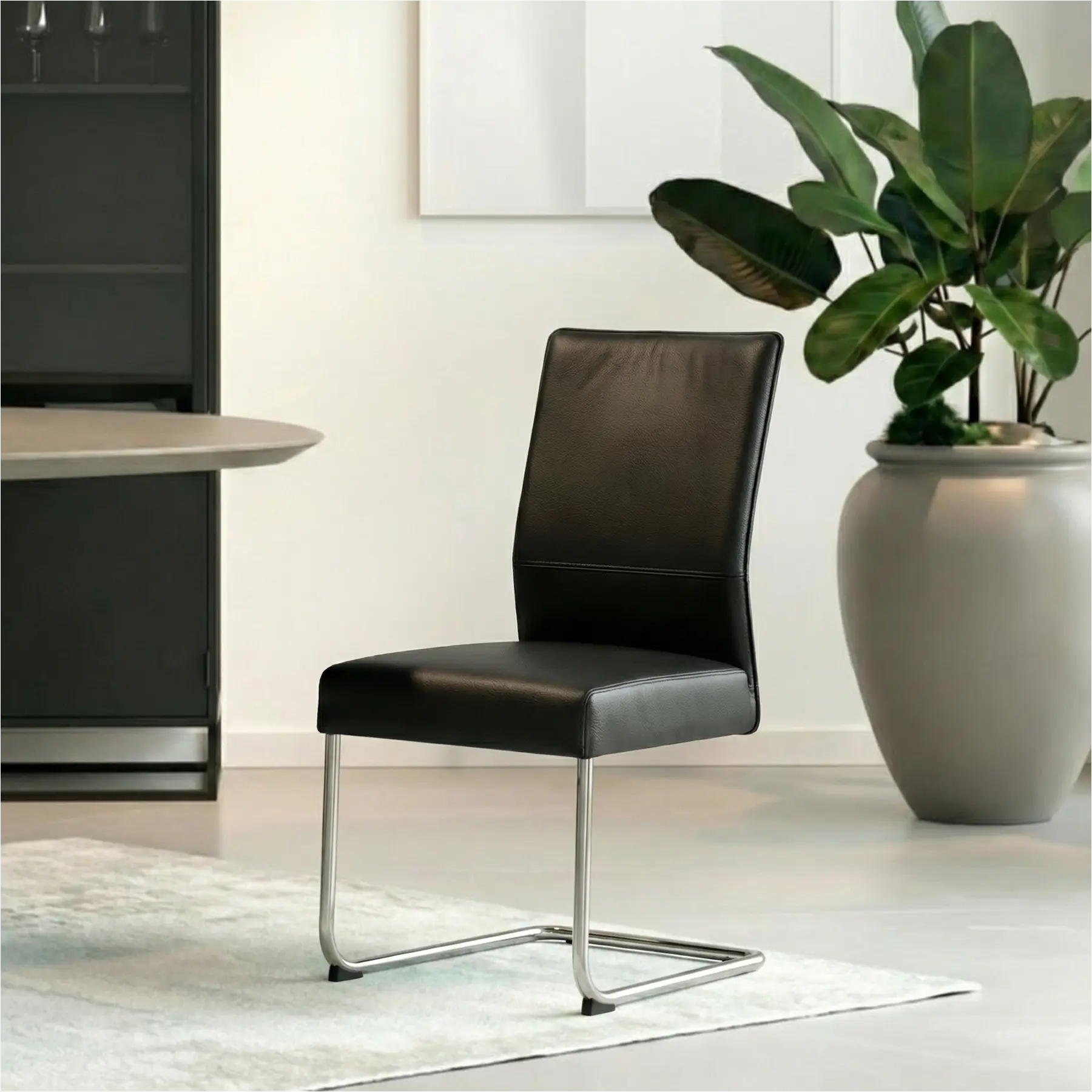 afbeelding van Set van 10 Leren eetkamerstoelen Piece - Toledo Nero (zwart) - Sledepoot staal rond RVS