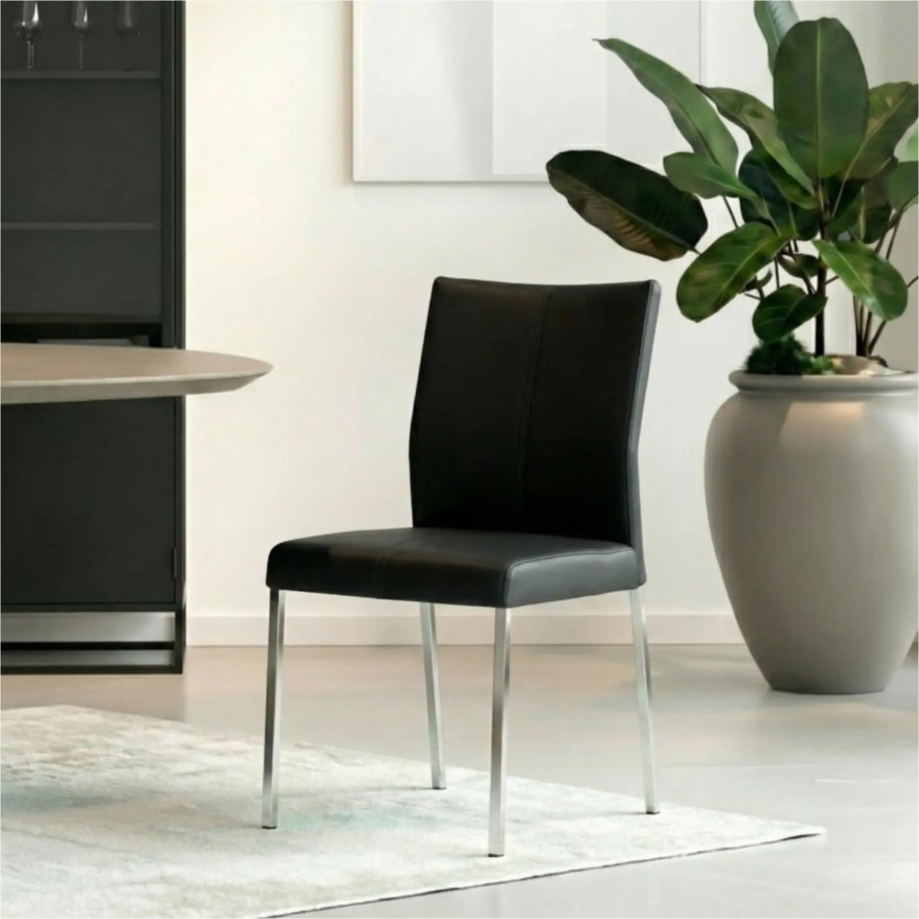 afbeelding van Set van 4 Leren eetkamerstoelen Basic - Hermes Nero (zwart) - Poten staal vierkant RVS