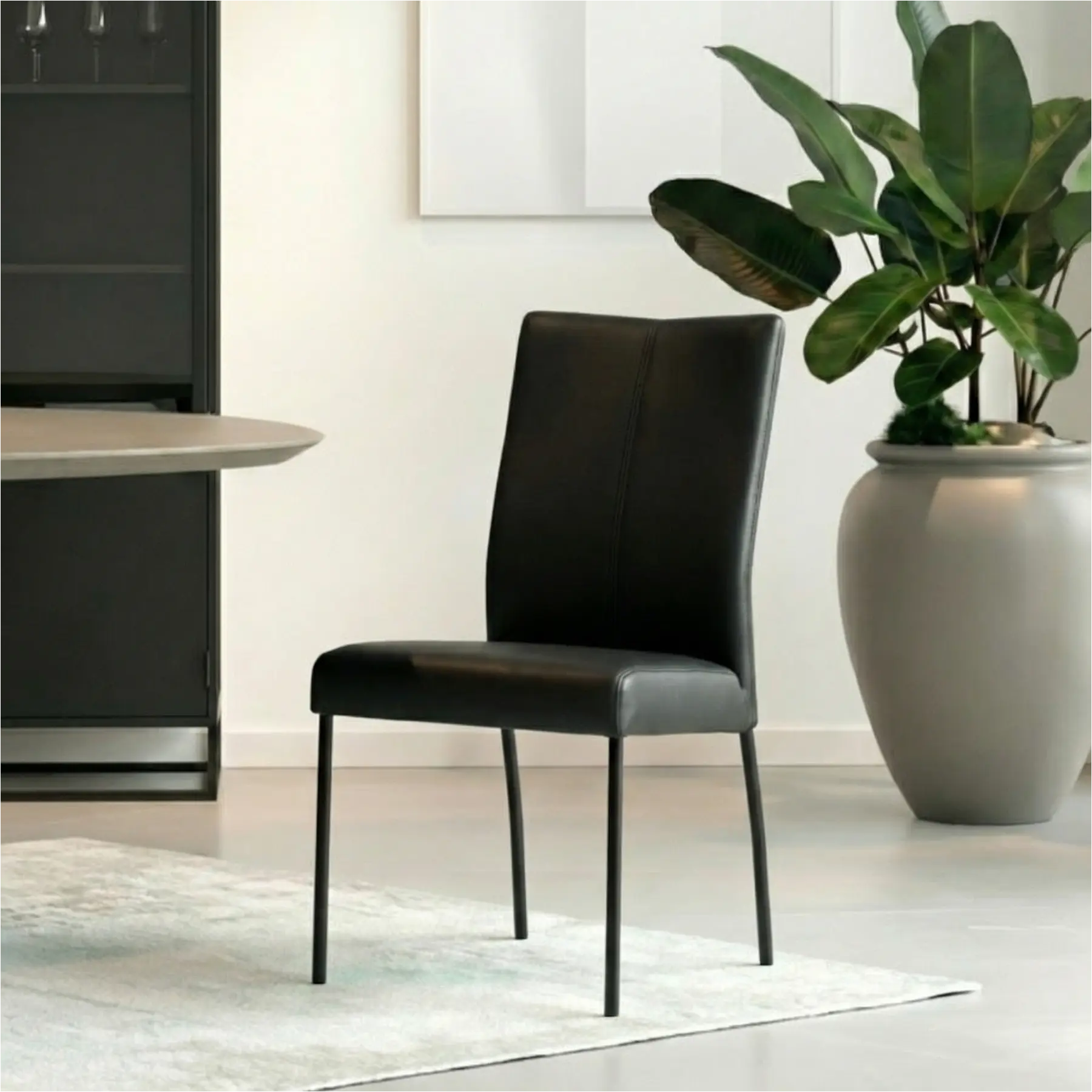 afbeelding van Set van 4 Leren eetkamerstoelen Comfort - Hermes Nero (zwart) - Poten staal rond zwart