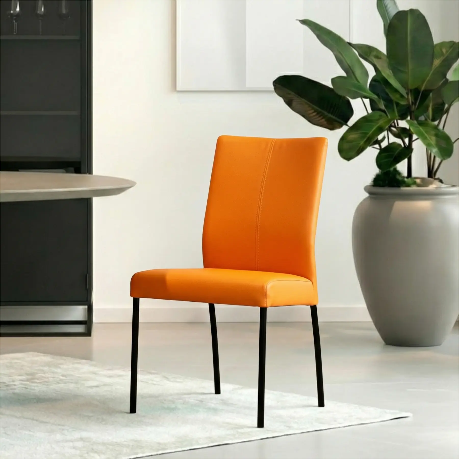 afbeelding van Set van 4 Leren eetkamerstoelen Comfort - Toledo Mandarin (oranje) - Poten staal rond zwart