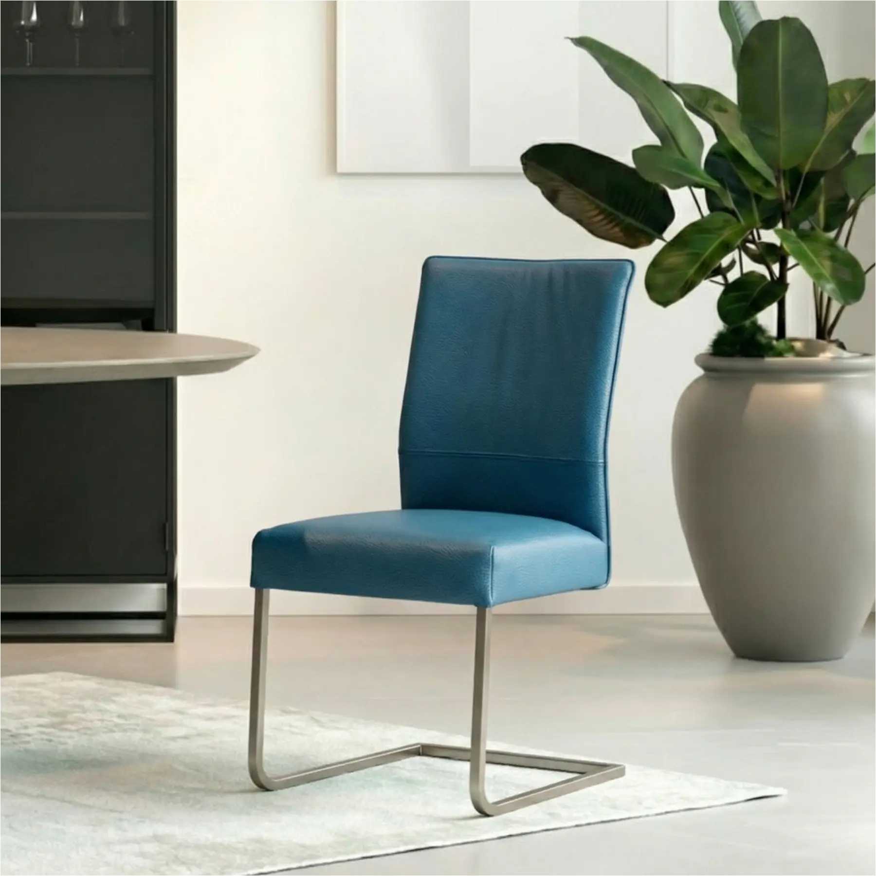 afbeelding van Set van 4 Leren eetkamerstoelen Remix - Toledo Turquoise (blauw) - Sledepoot staal vierkant RVS