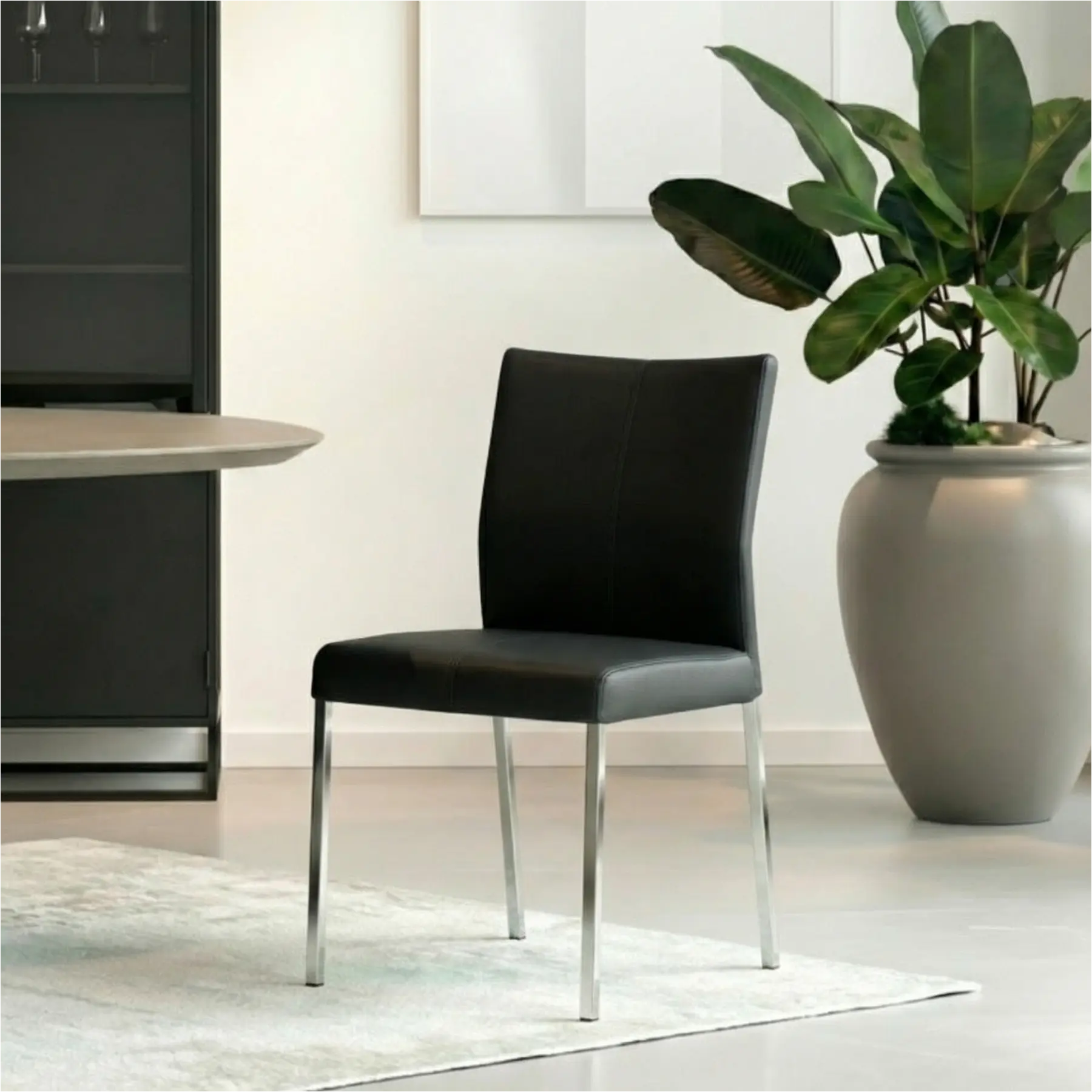 afbeelding van Set van 6 Leren eetkamerstoelen Basic - Toledo Nero (zwart) - Poten staal vierkant RVS