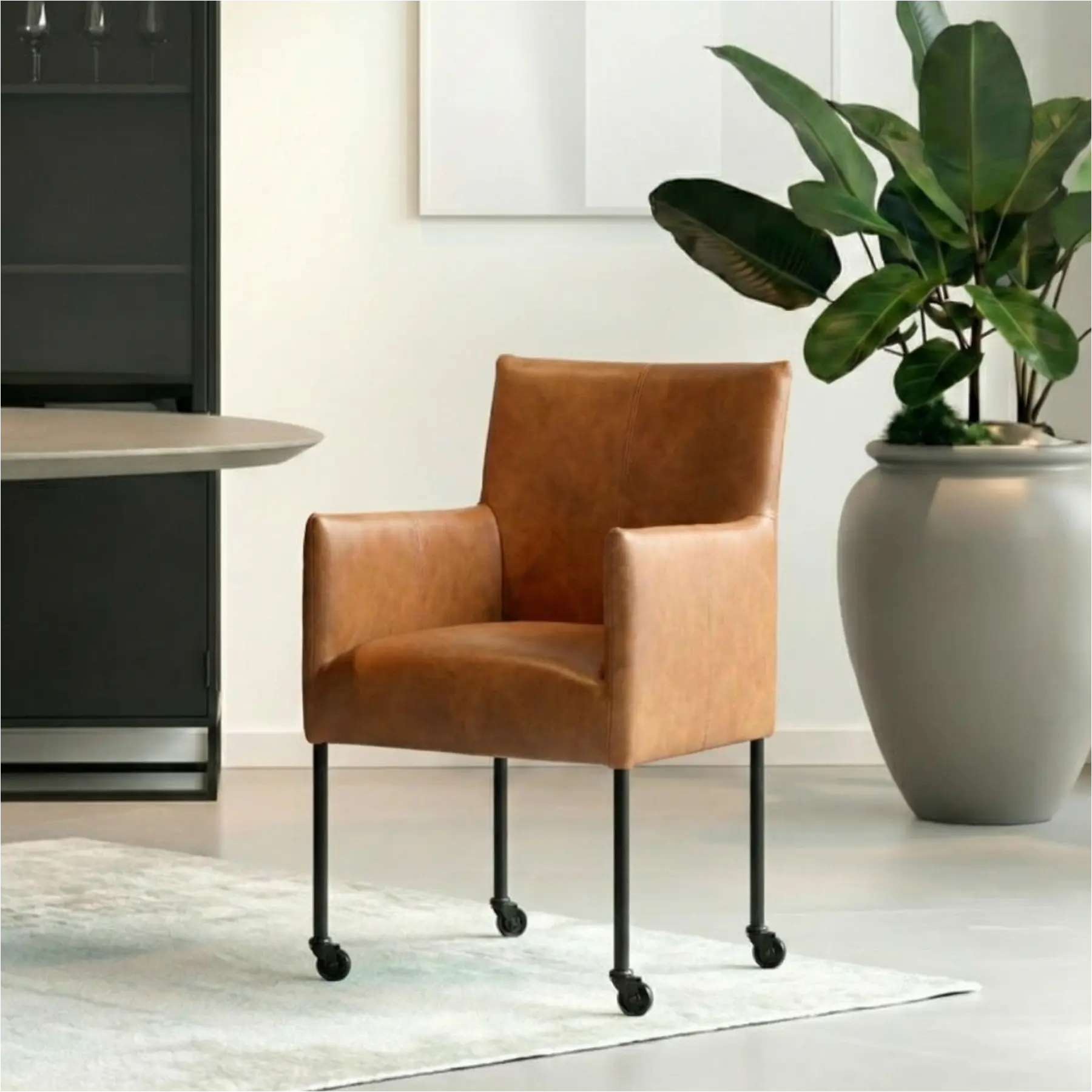 afbeelding van Set van 6 Leren eetkamerstoelen Desire - Granada Sahara (cognac) - Poten staal rond zwart