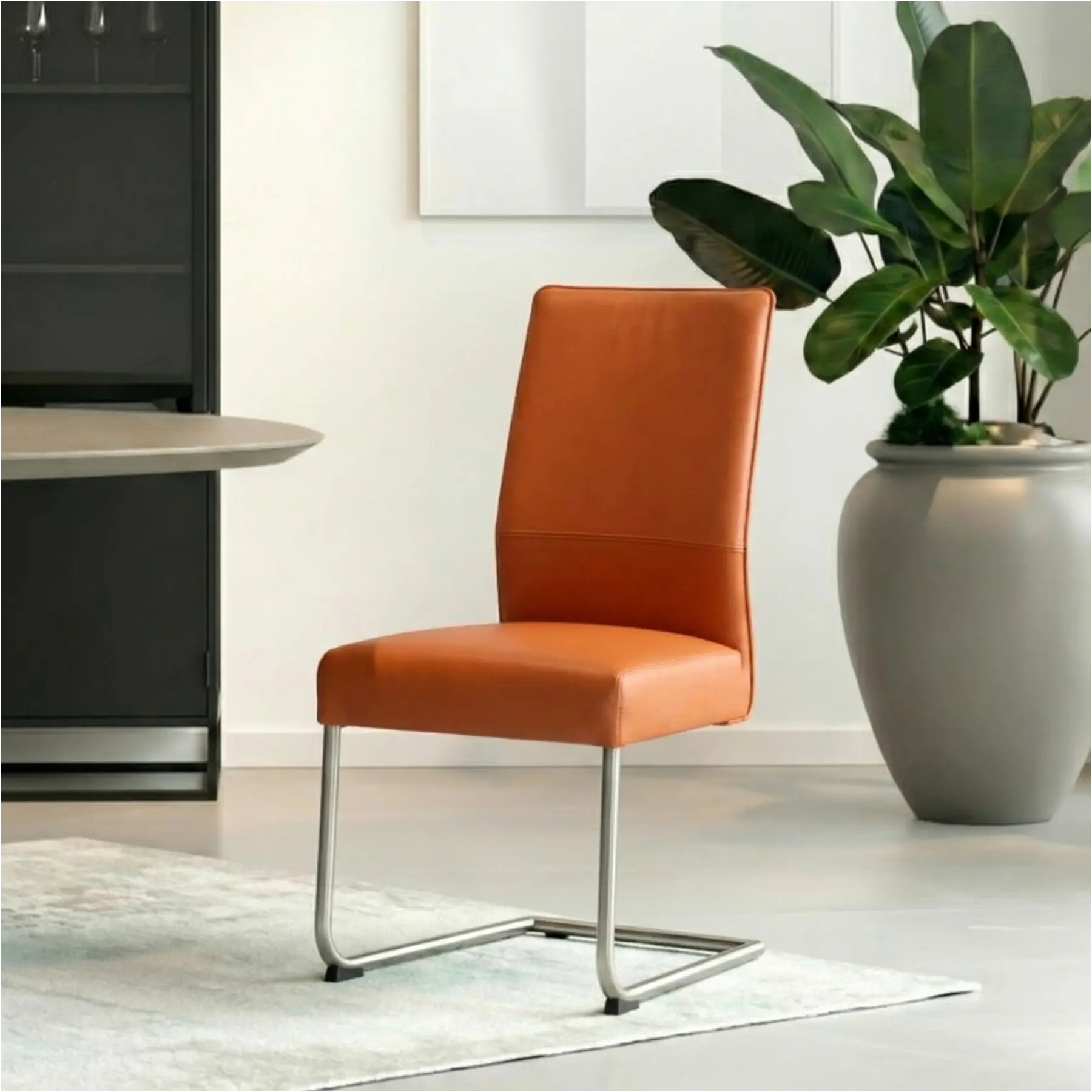 afbeelding van Set van 6 Leren eetkamerstoelen Piece - Toledo Cotto (cognac) - Sledepoot staal rond RVS