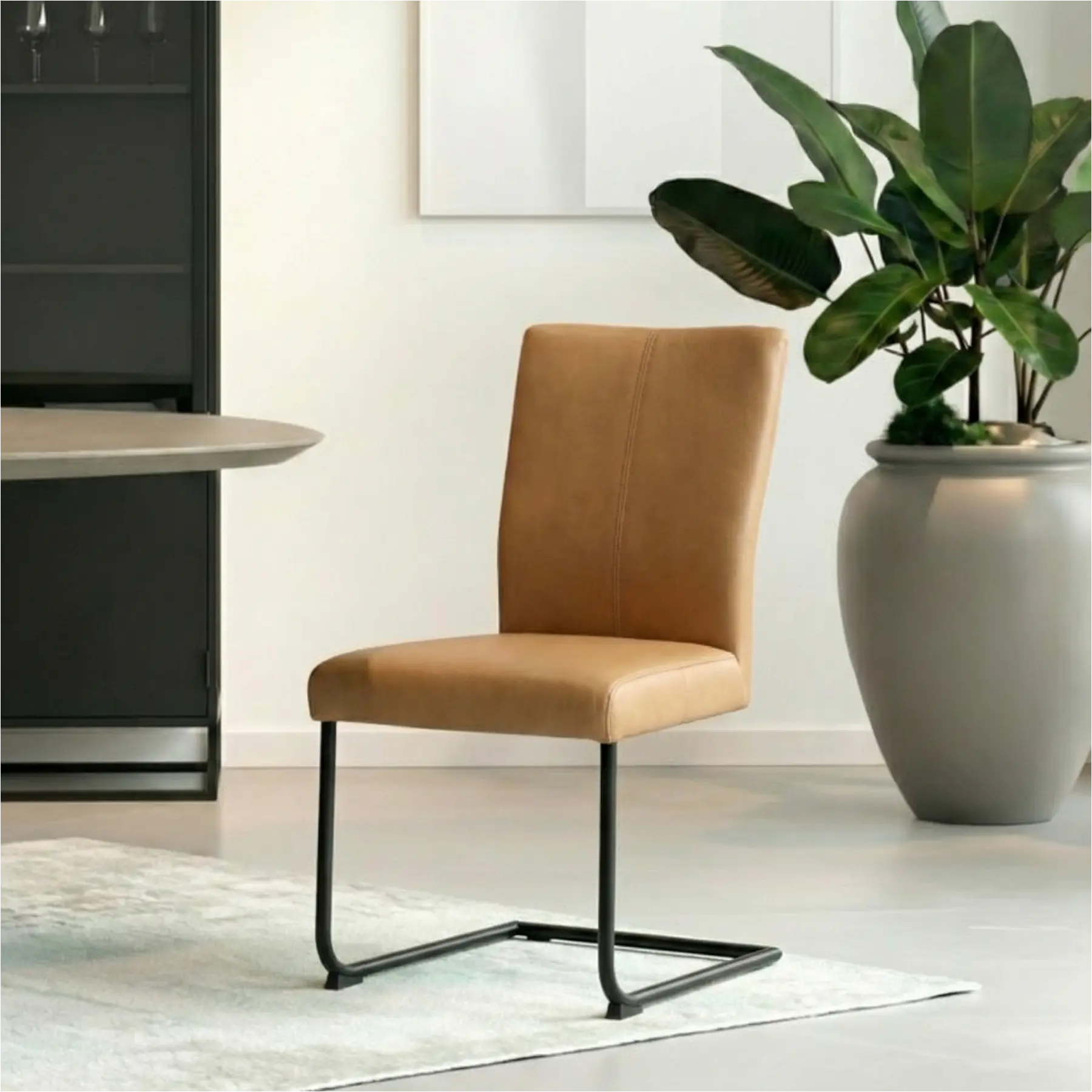 afbeelding van Set van 8 Leren eetkamerstoelen Dry - Toledo Camel (bruin) - Sledepoot staal rond zwart