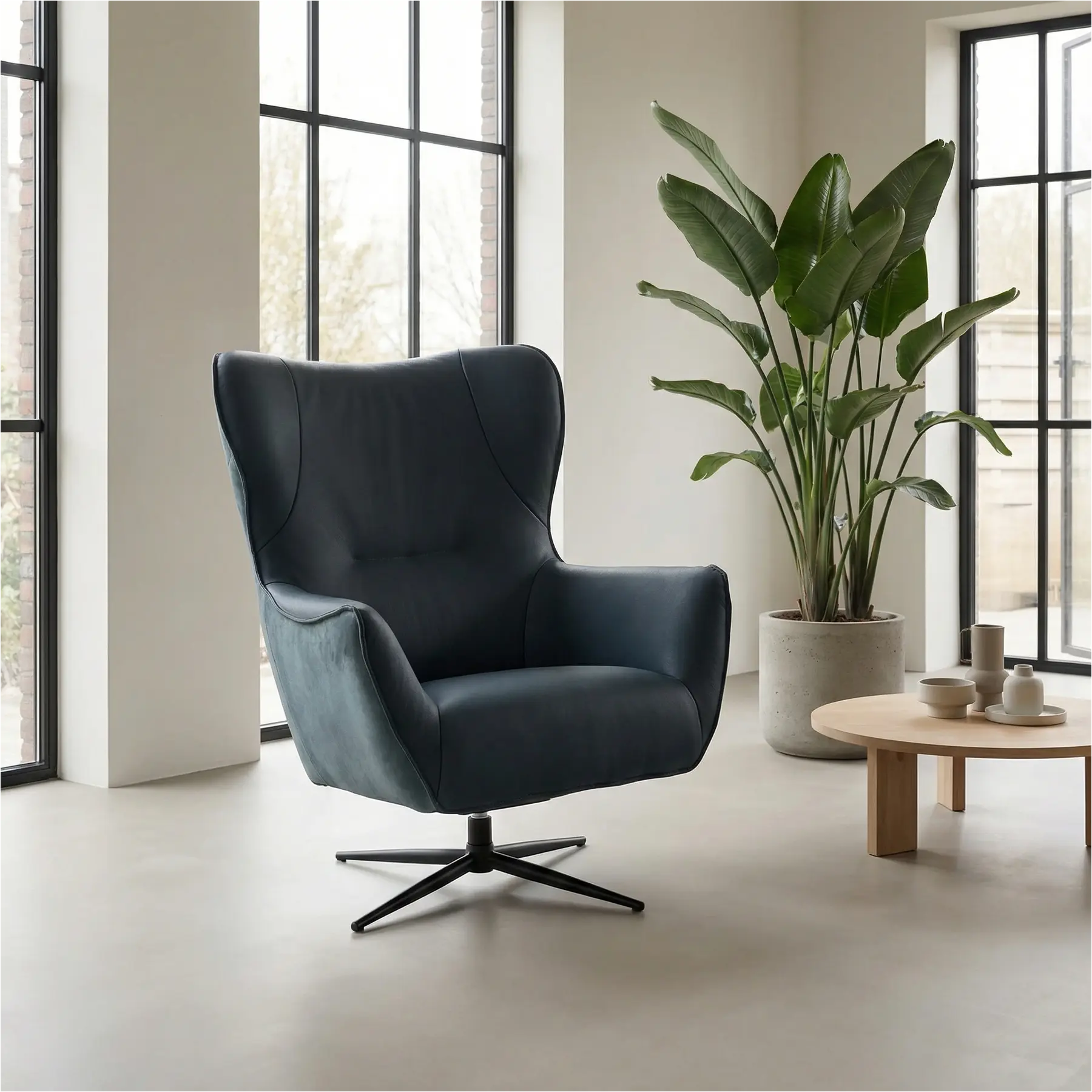 afbeelding van Leren draaifauteuil Leaf Duo - Kenia Denim en Toledo Marine - Stervoet zwart