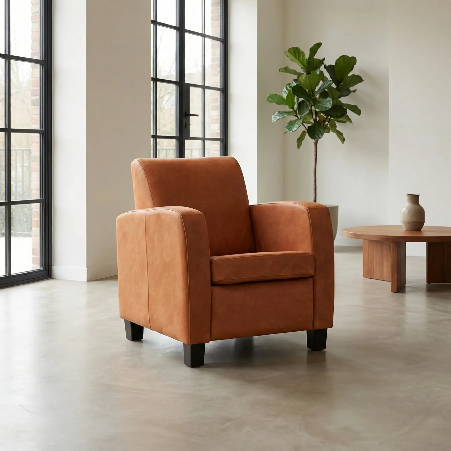 afbeelding van Leren fauteuil Joy - Kenia Rost (oranje) - Poten hout bruin