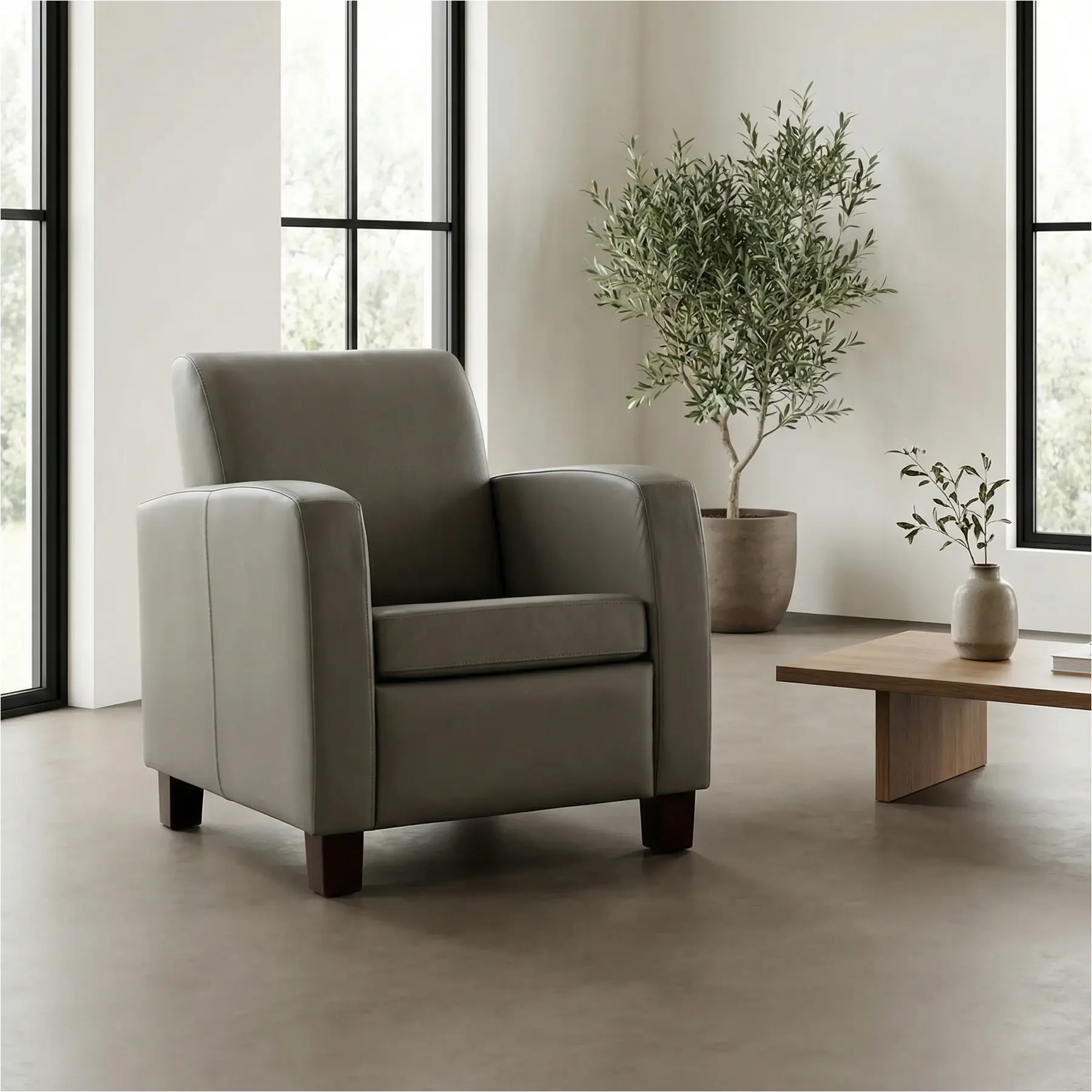 afbeelding van Leren fauteuil Joy - Toledo Smog (grijs) - Poten hout zwart