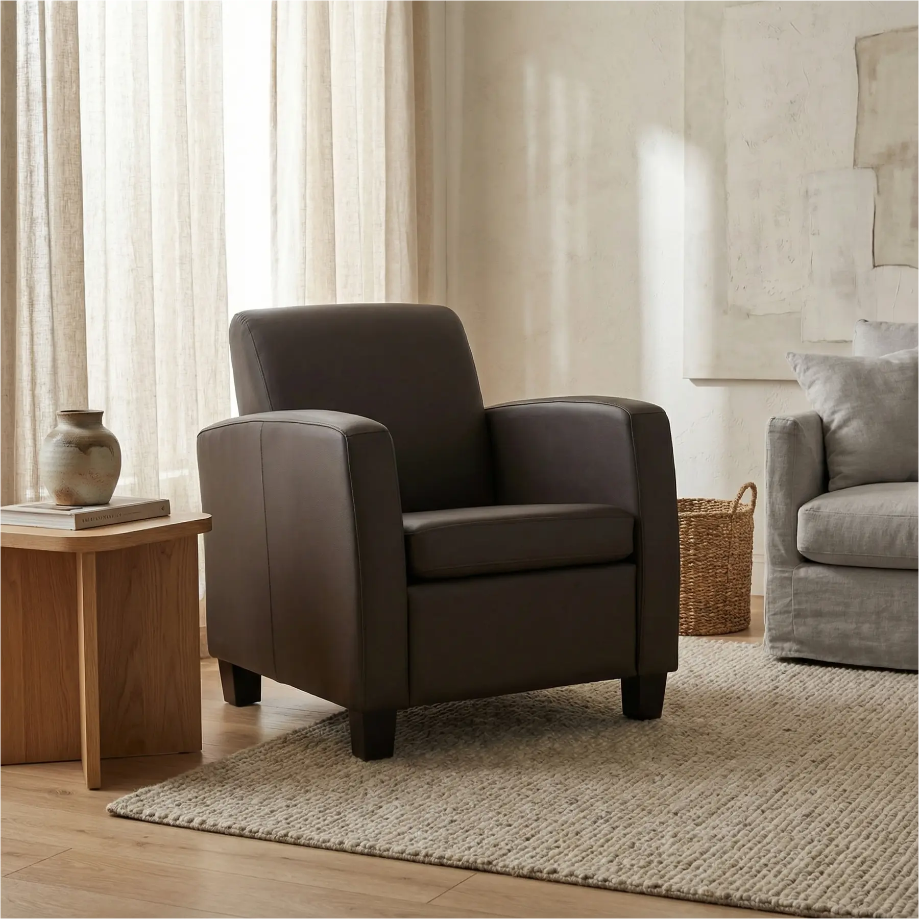 afbeelding van Leren fauteuil Joy - Hermes Caffe (donkerbruin) - Poten hout zwart