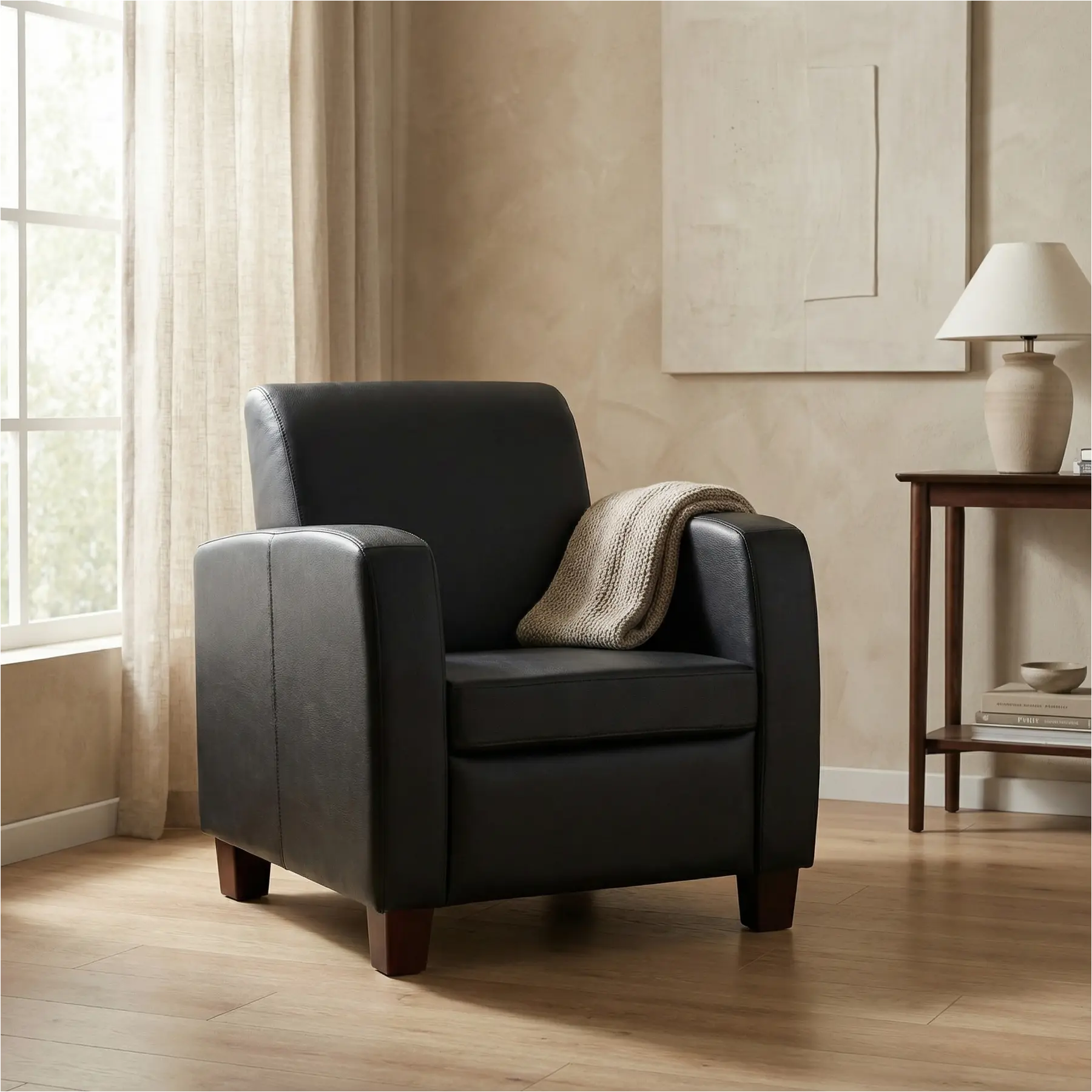 afbeelding van Leren fauteuil Joy - Toledo Nero (zwart) - Poten hout bruin