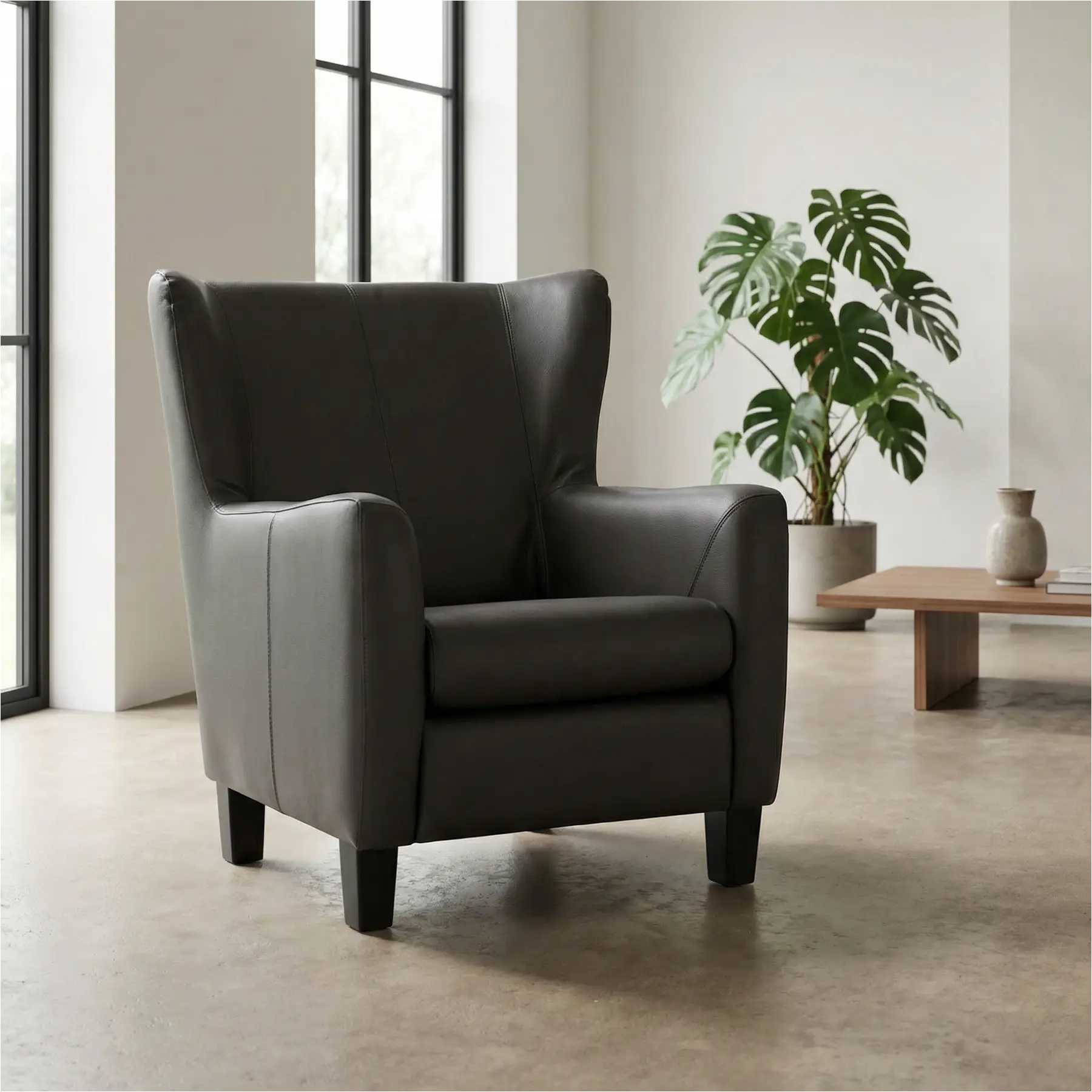 afbeelding van Set van 2 Leren fauteuils Hug - Hermes Antracite (donkergrijs) - Poten hout zwart